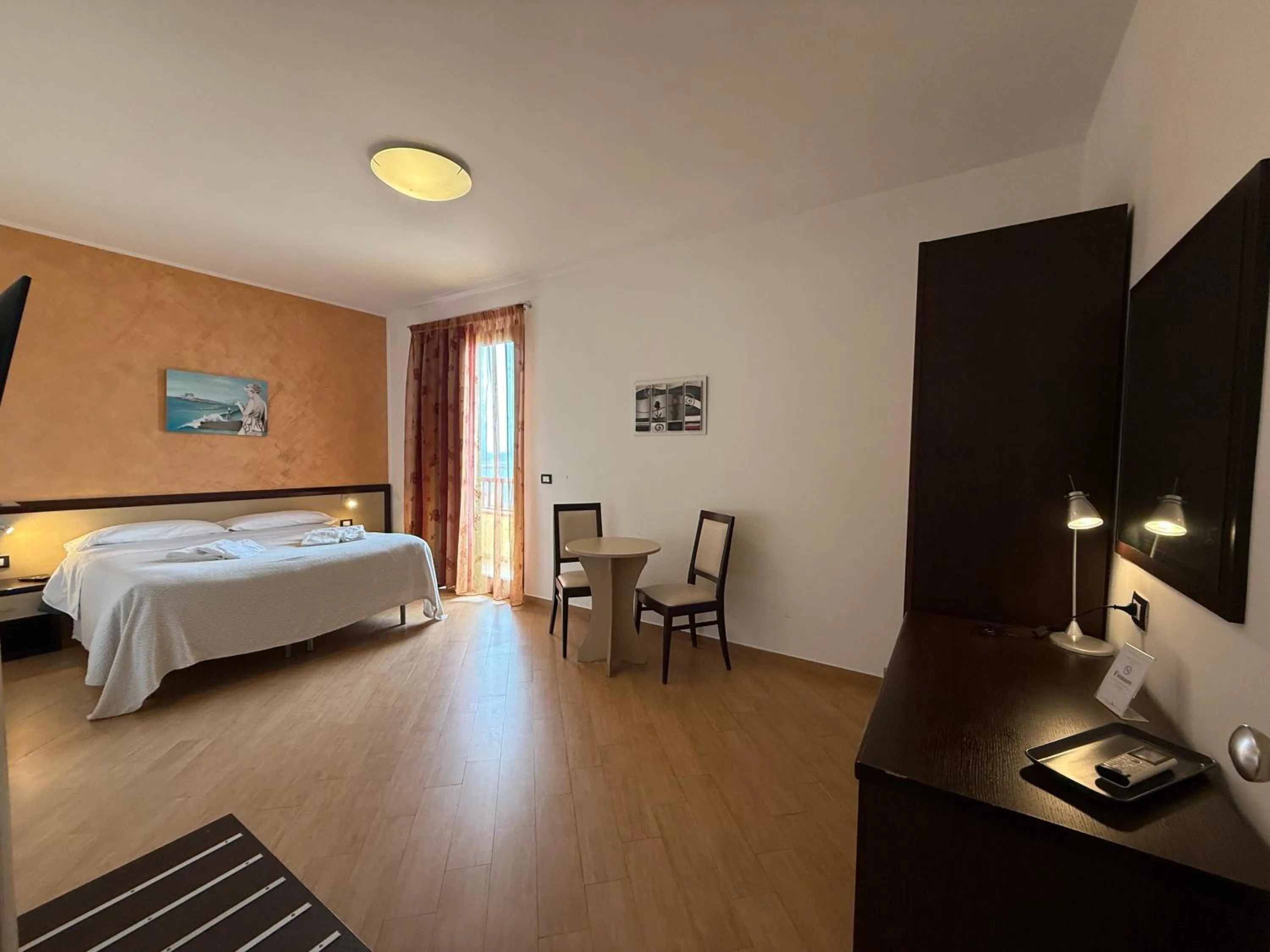 Bed in Albergo Perseo