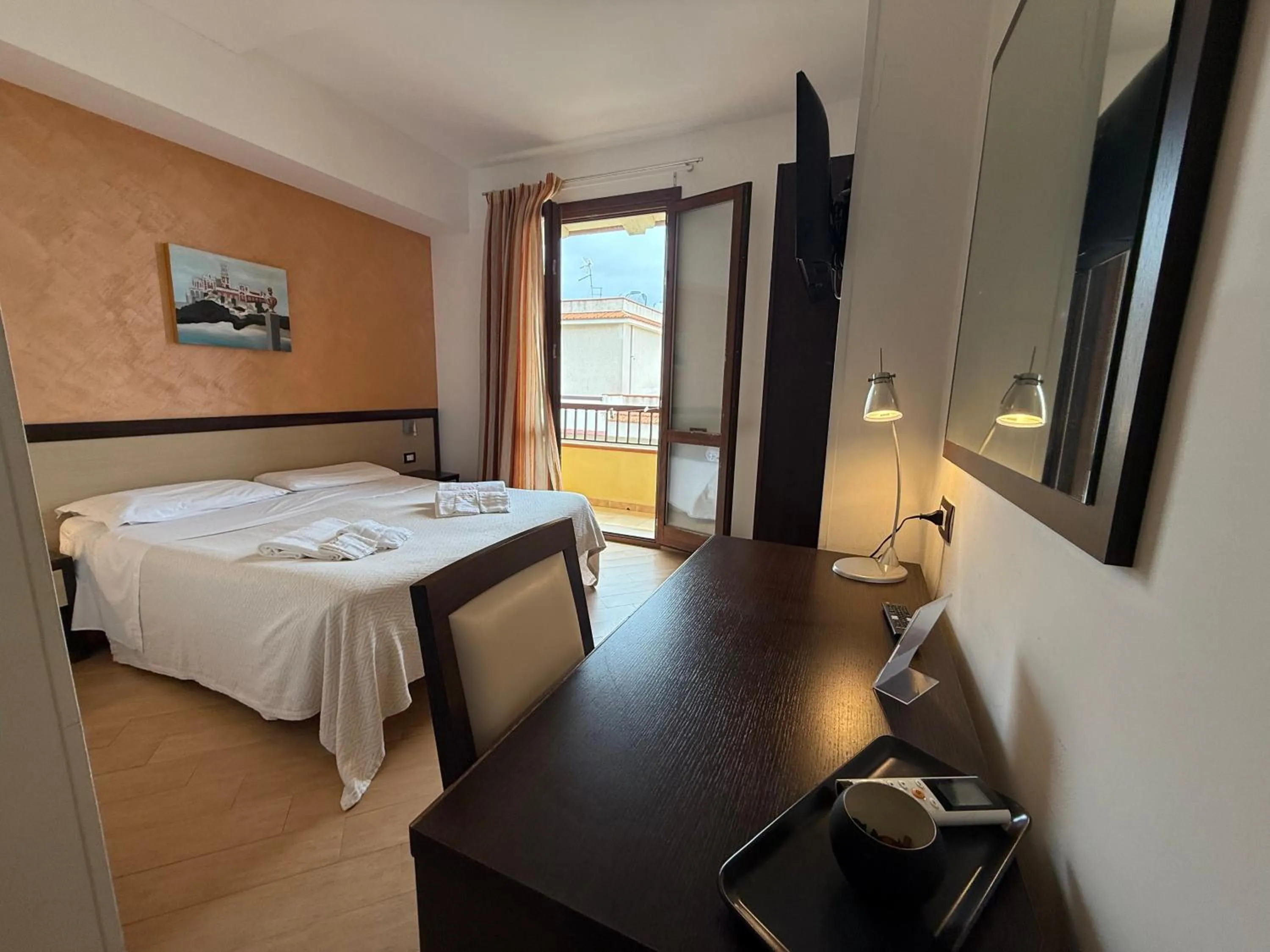 Bed in Albergo Perseo