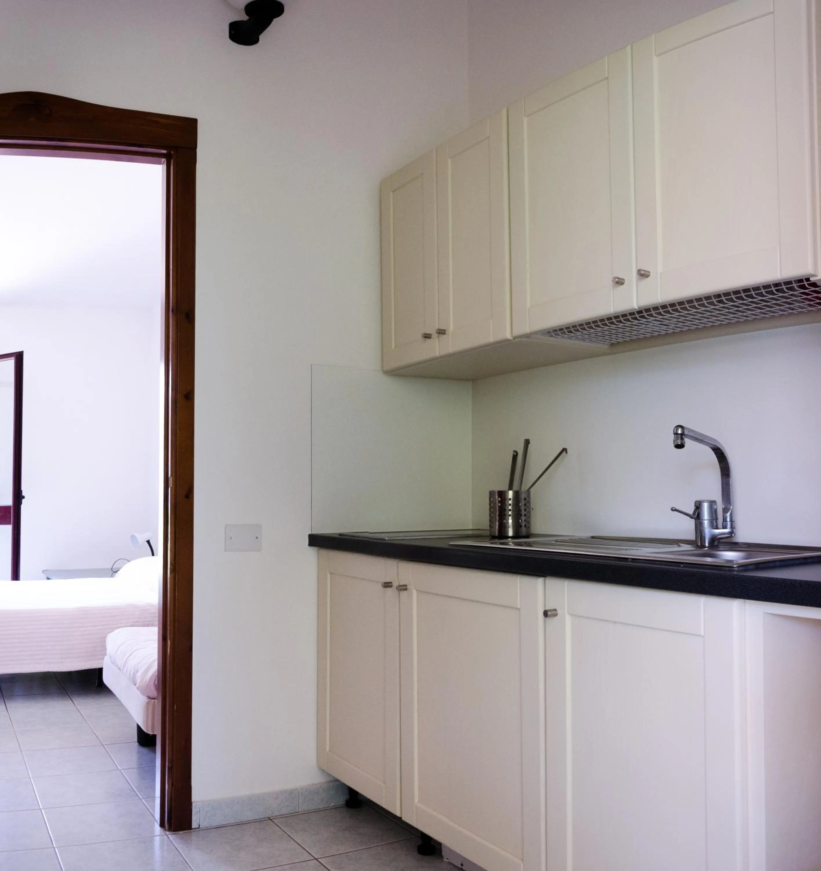 Kitchen or kitchenette, Bed in Residence Cort'e Accas
