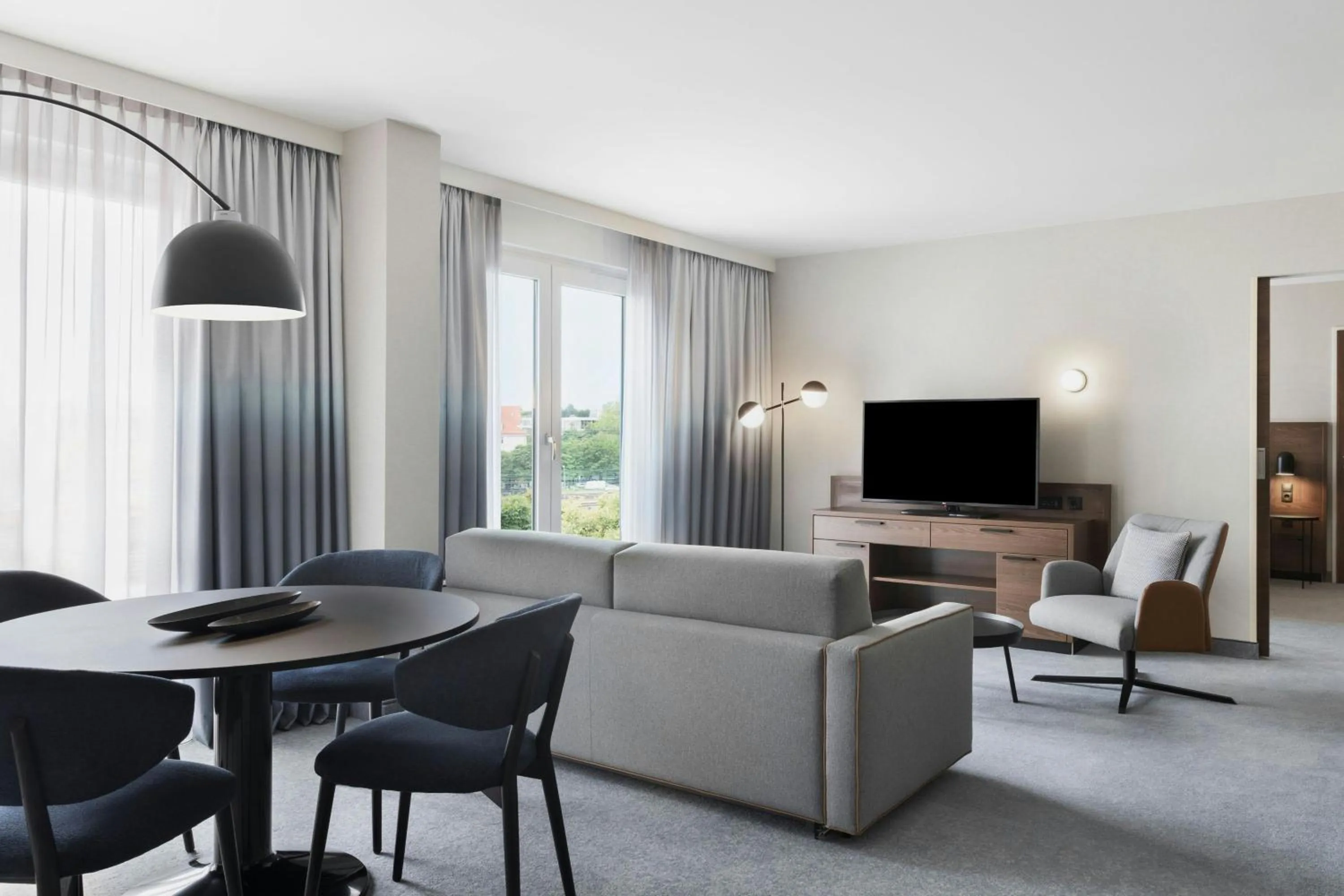 Living room in Courtyard by Marriott Munich City East