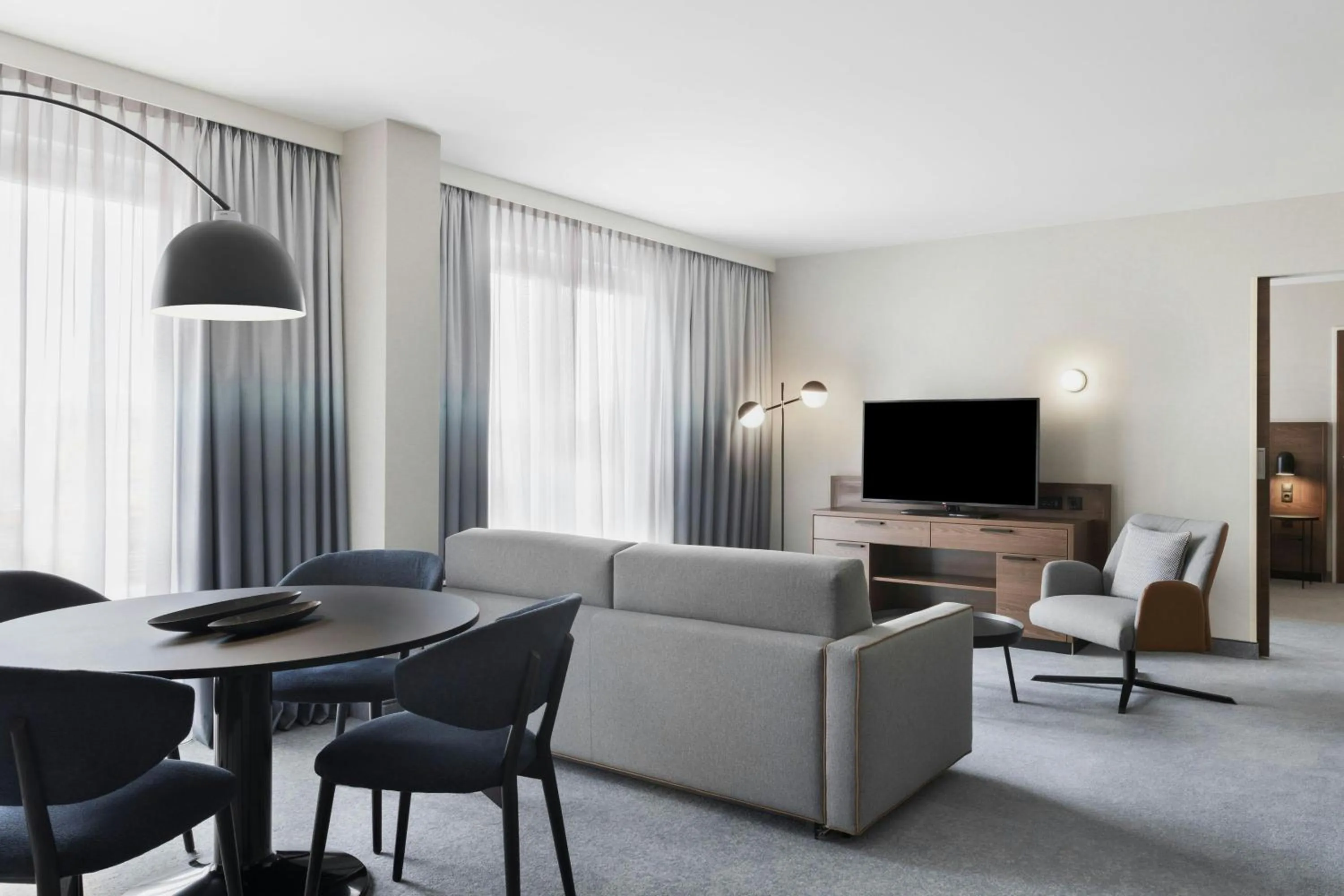 Living room in Courtyard by Marriott Munich City East