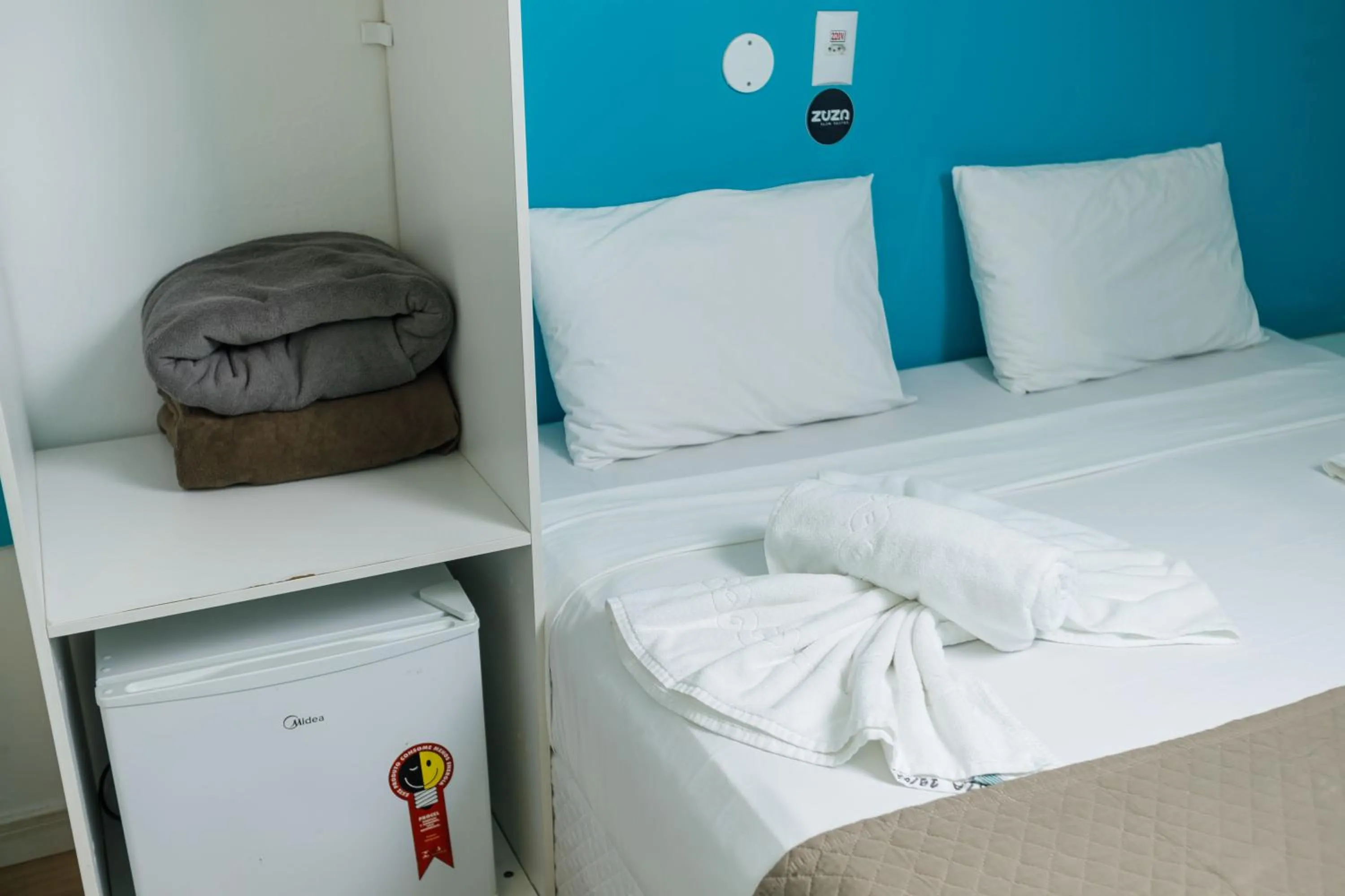 Bed in Zuza Slim Suítes