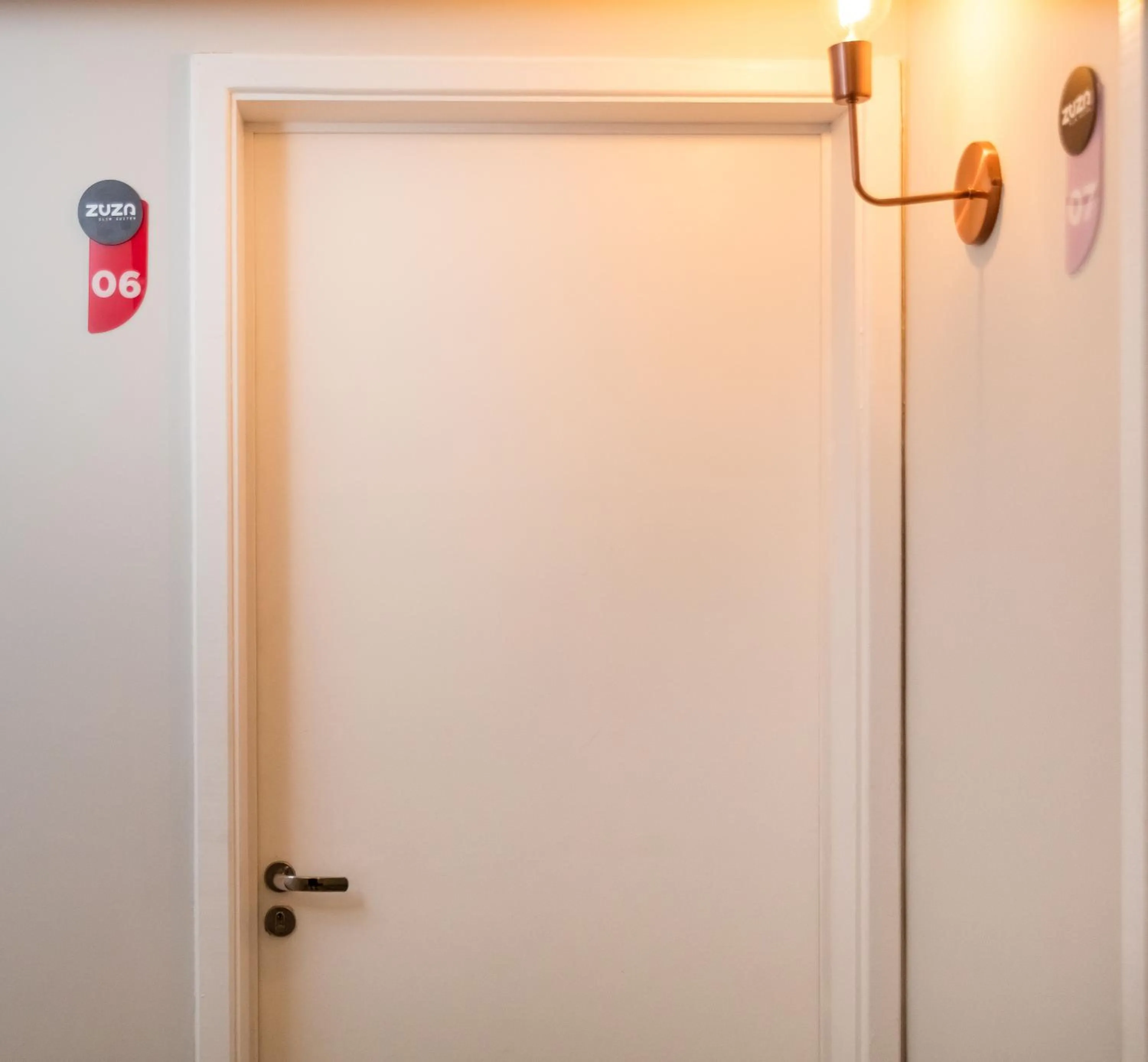 Logo/Certificate/Sign in Zuza Slim Suítes