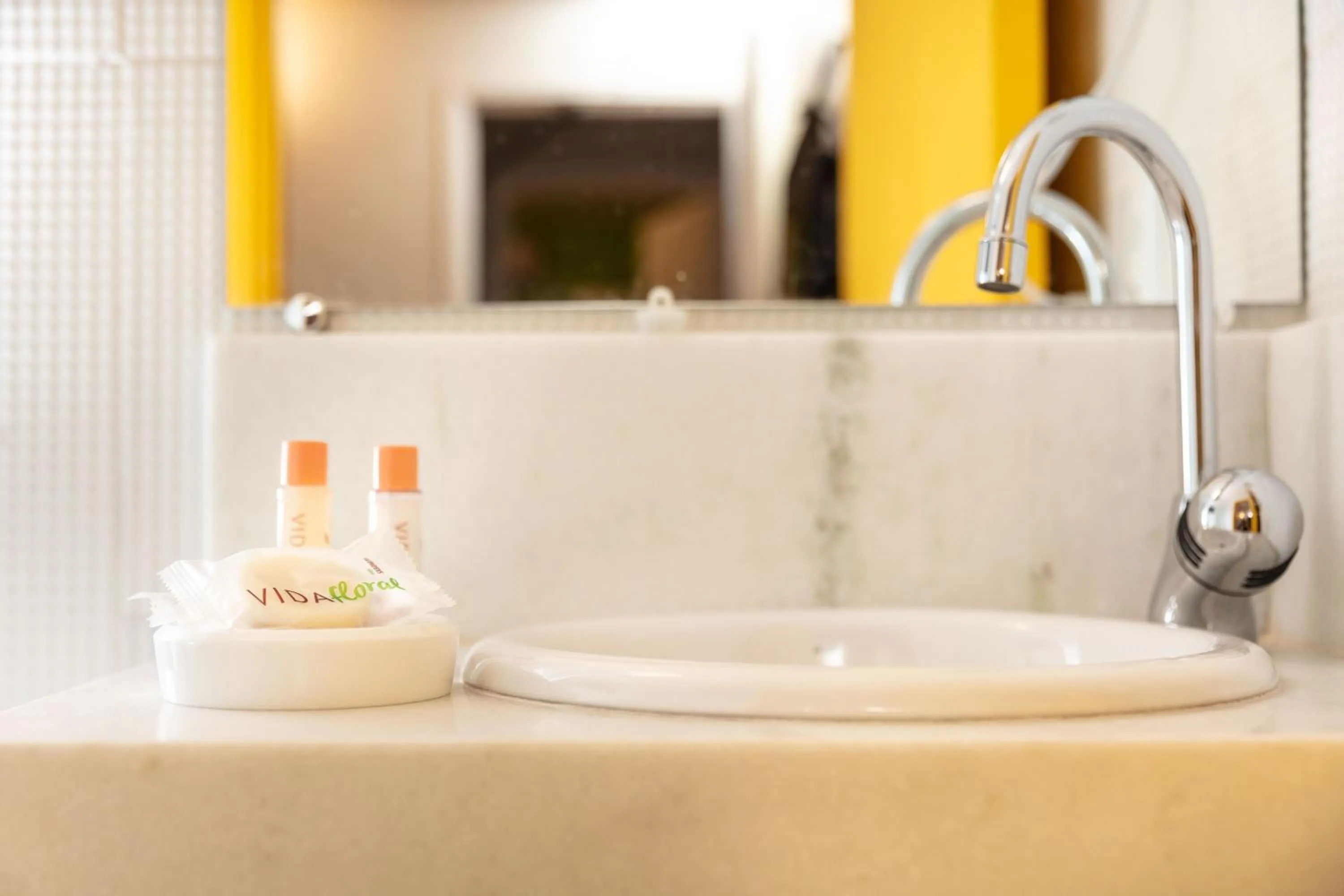 Bathroom in Zuza Slim Suítes