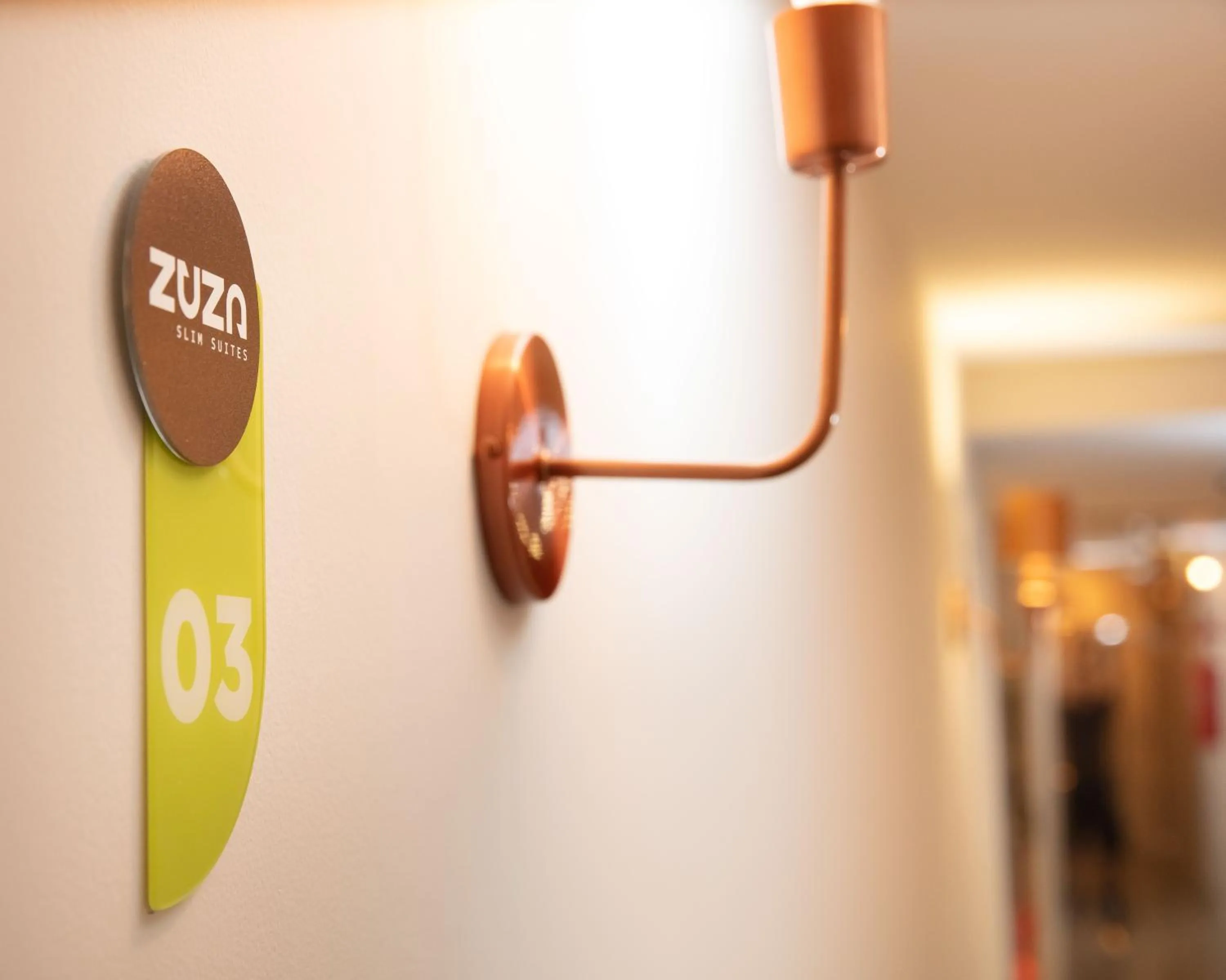 Logo/Certificate/Sign in Zuza Slim Suítes