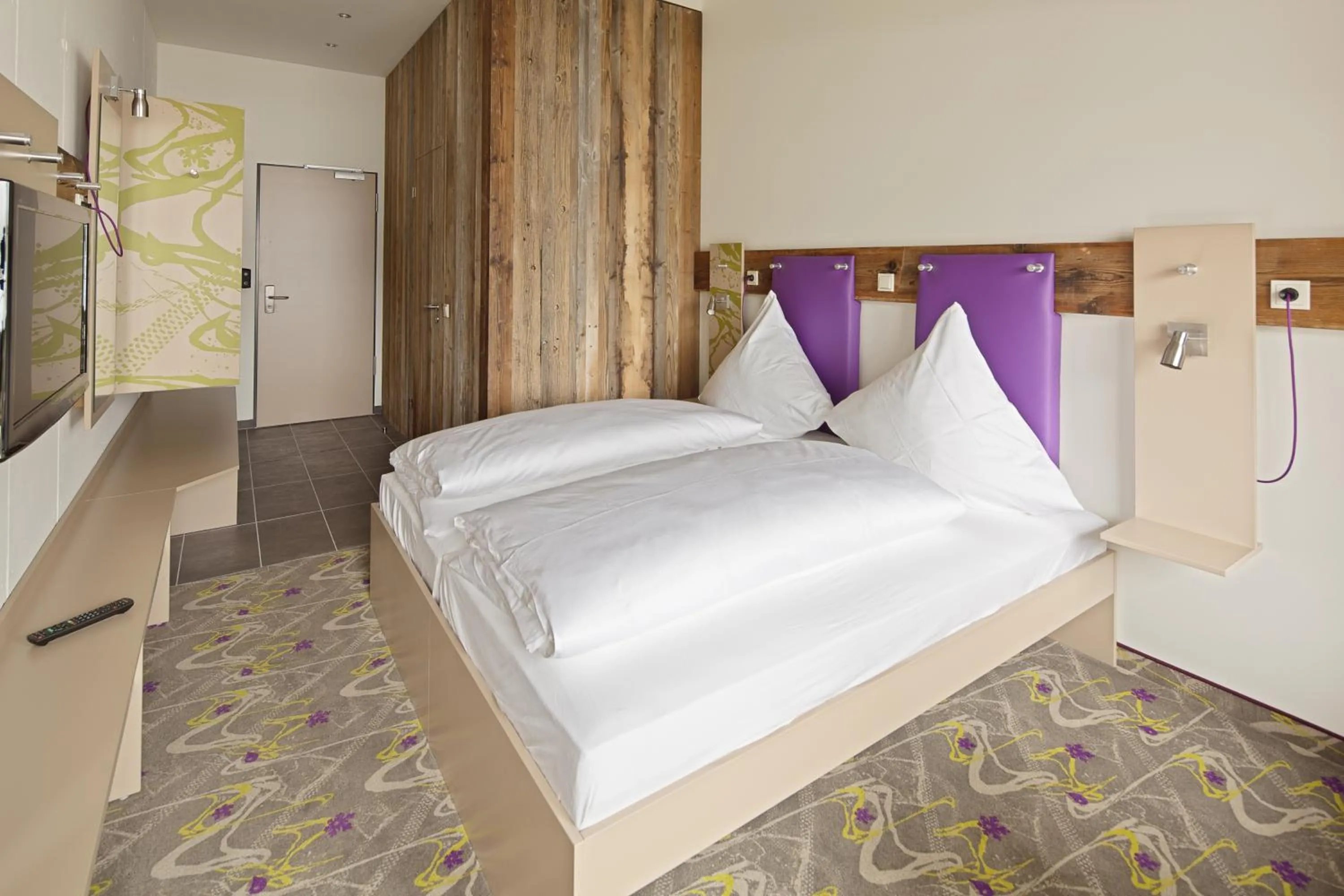 Bed in Explorer Hotel Montafon