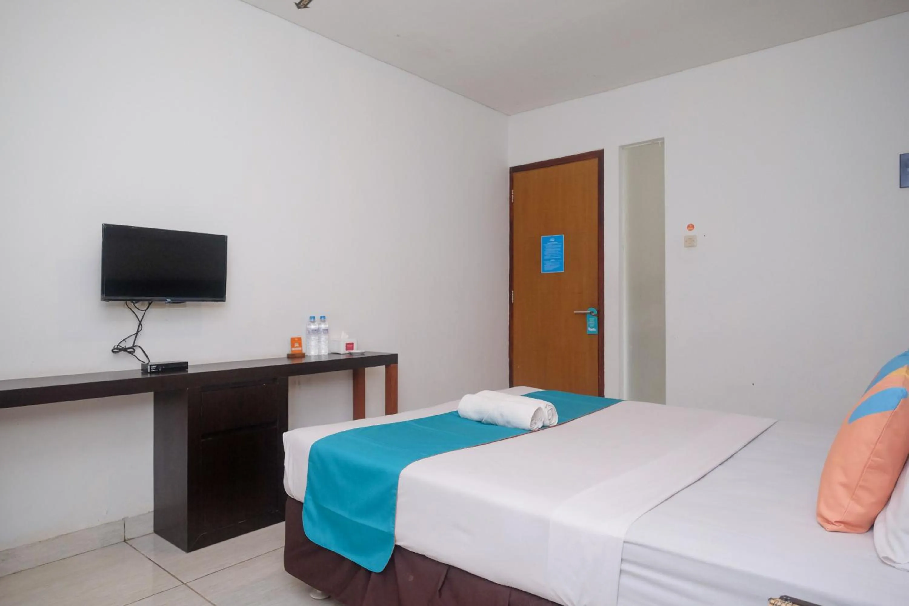 Bedroom, Bed in Sans Hotel Prime Cailendra Yogyakarta by RedDoorz