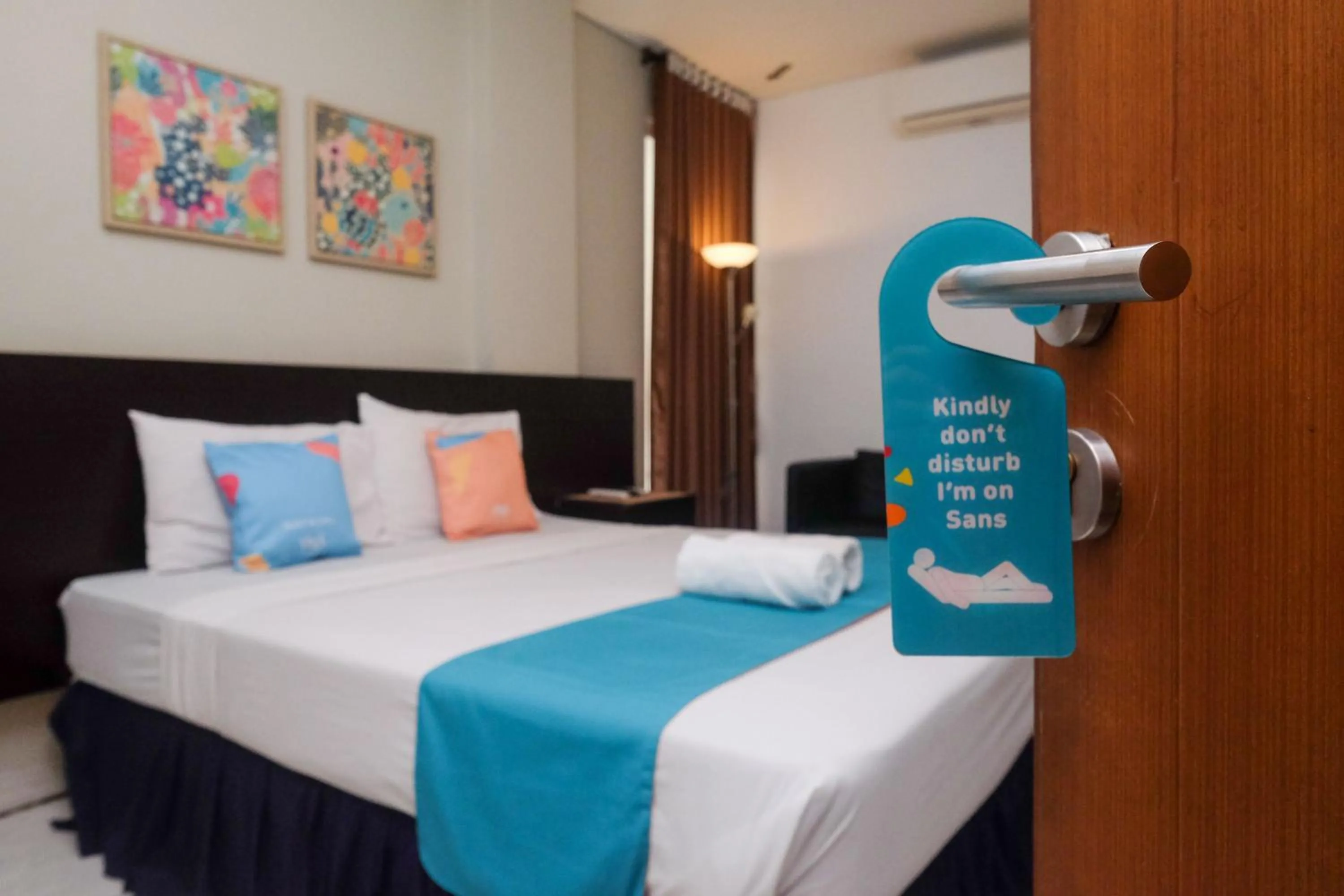 Bedroom, Bed in Sans Hotel Prime Cailendra Yogyakarta by RedDoorz