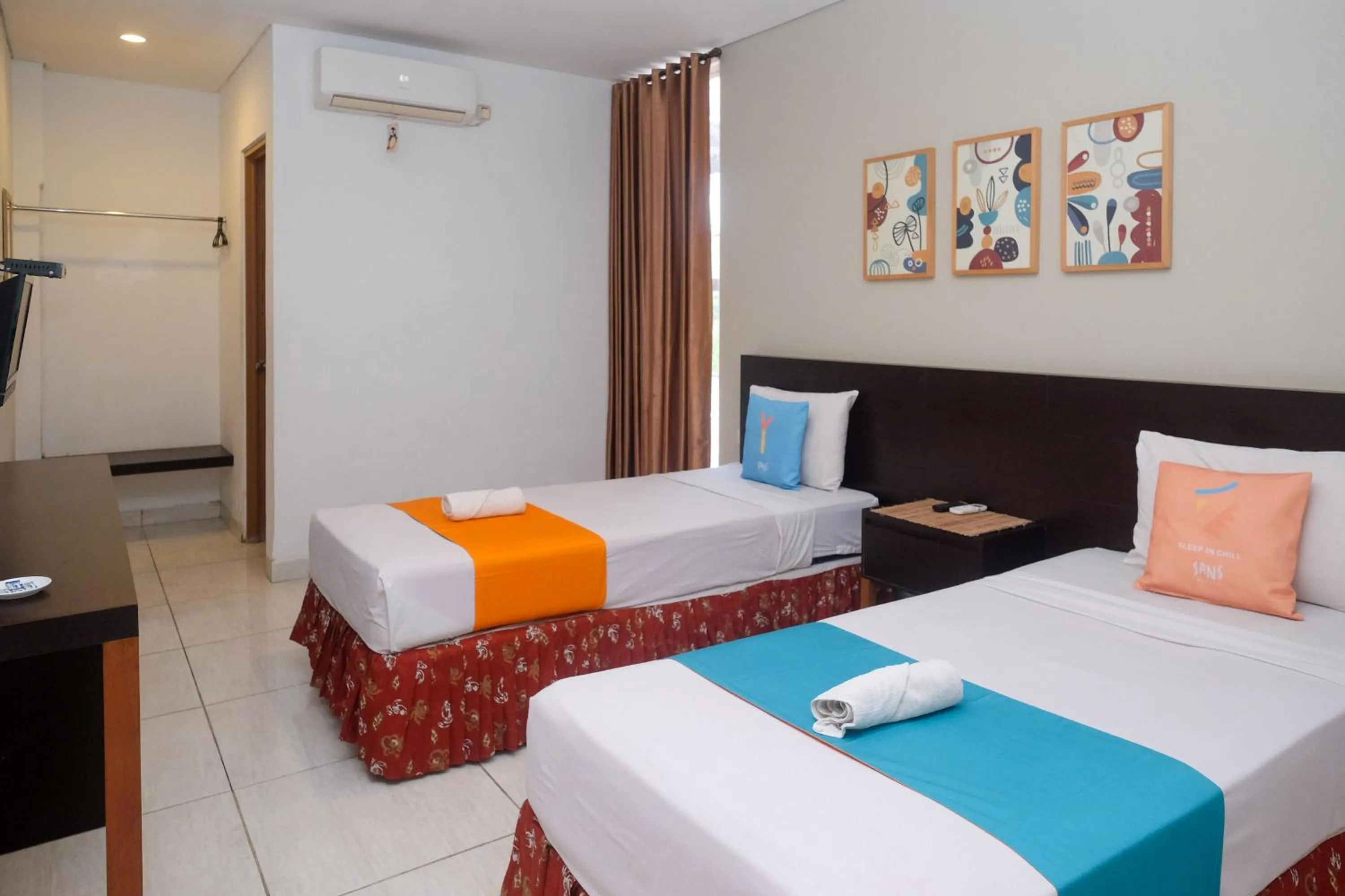 Bedroom, Bed in Sans Hotel Prime Cailendra Yogyakarta by RedDoorz
