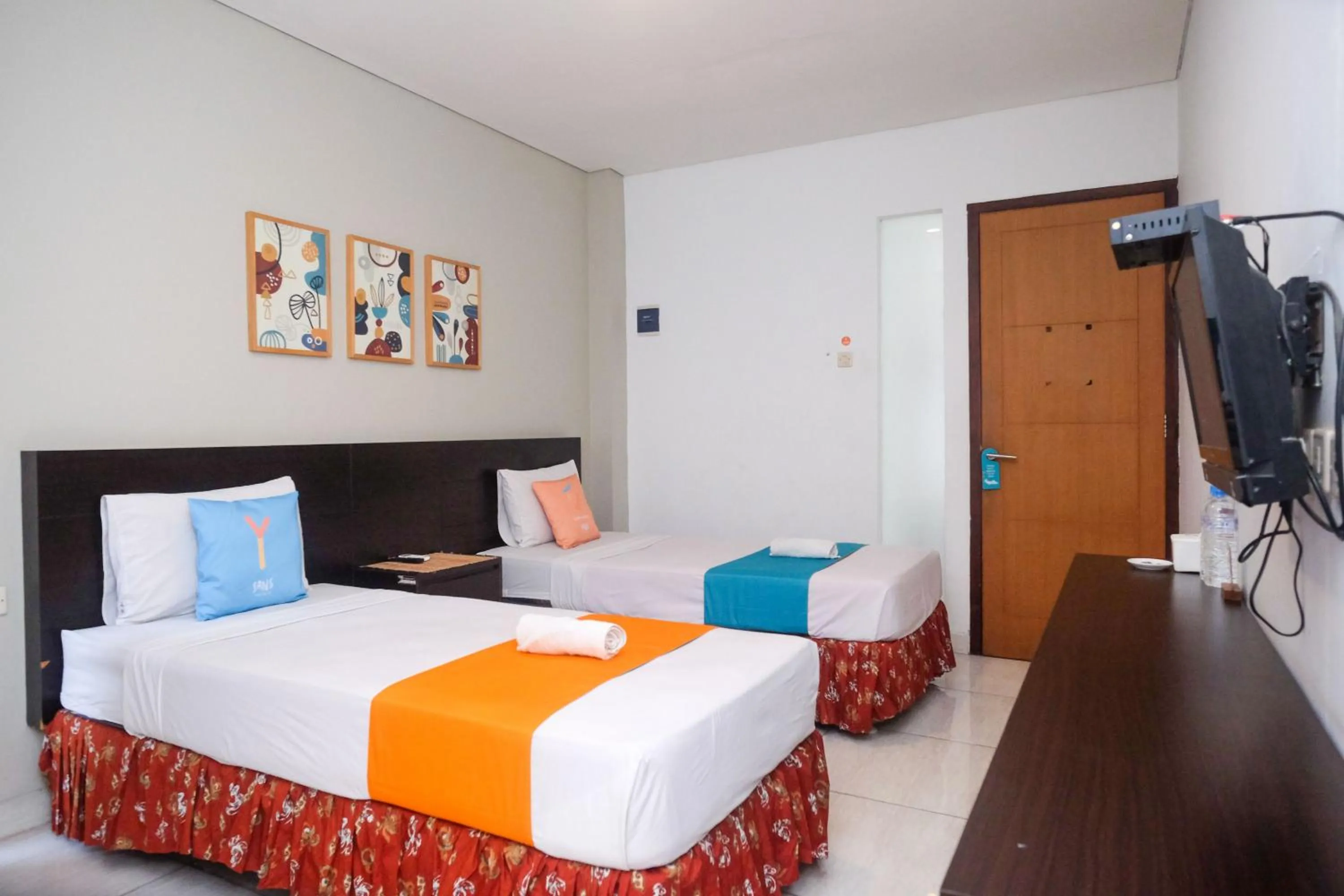 Bedroom, Bed in Sans Hotel Prime Cailendra Yogyakarta by RedDoorz