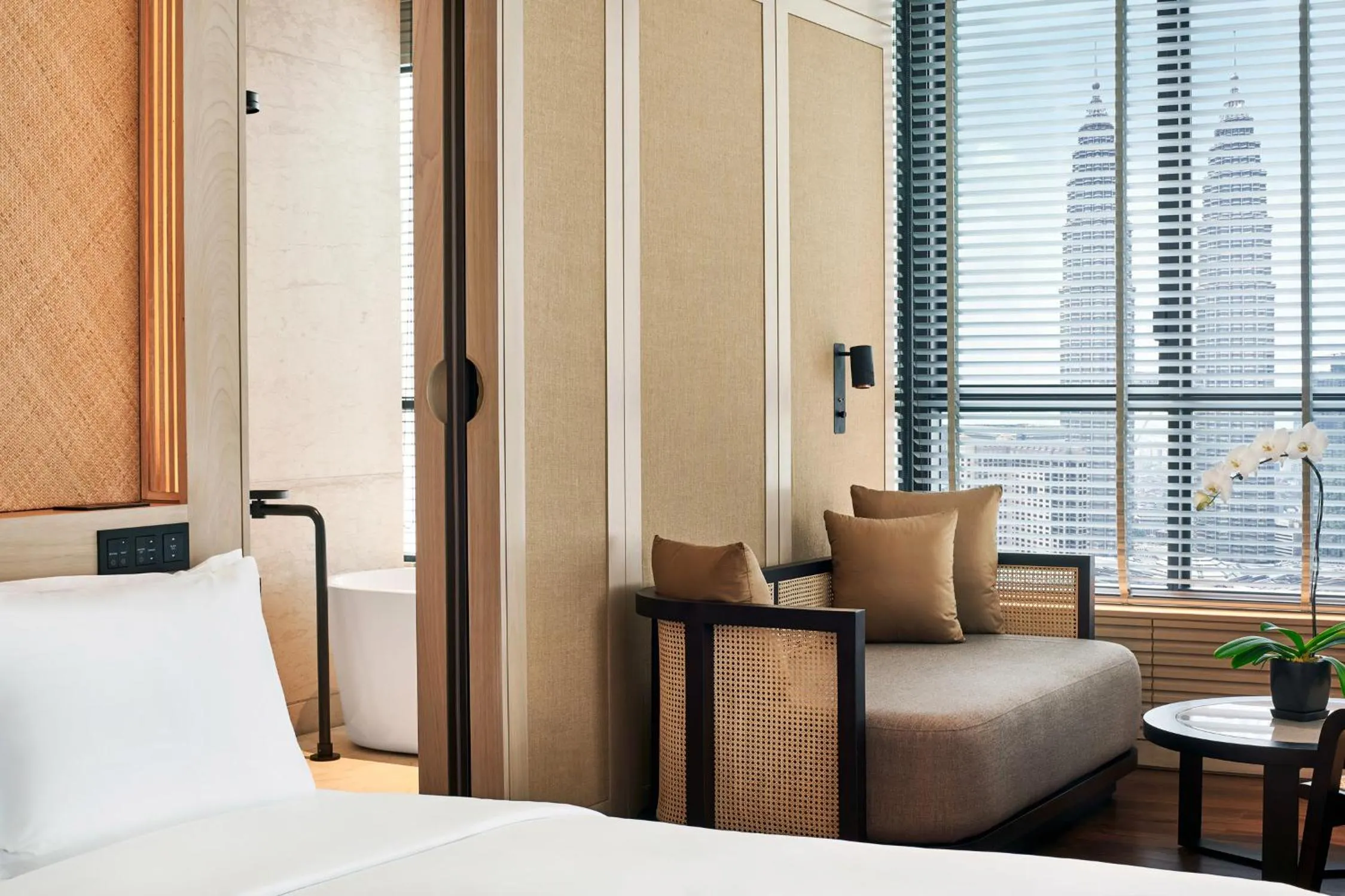 Seating area, Bed in The RuMa Hotel and Residences