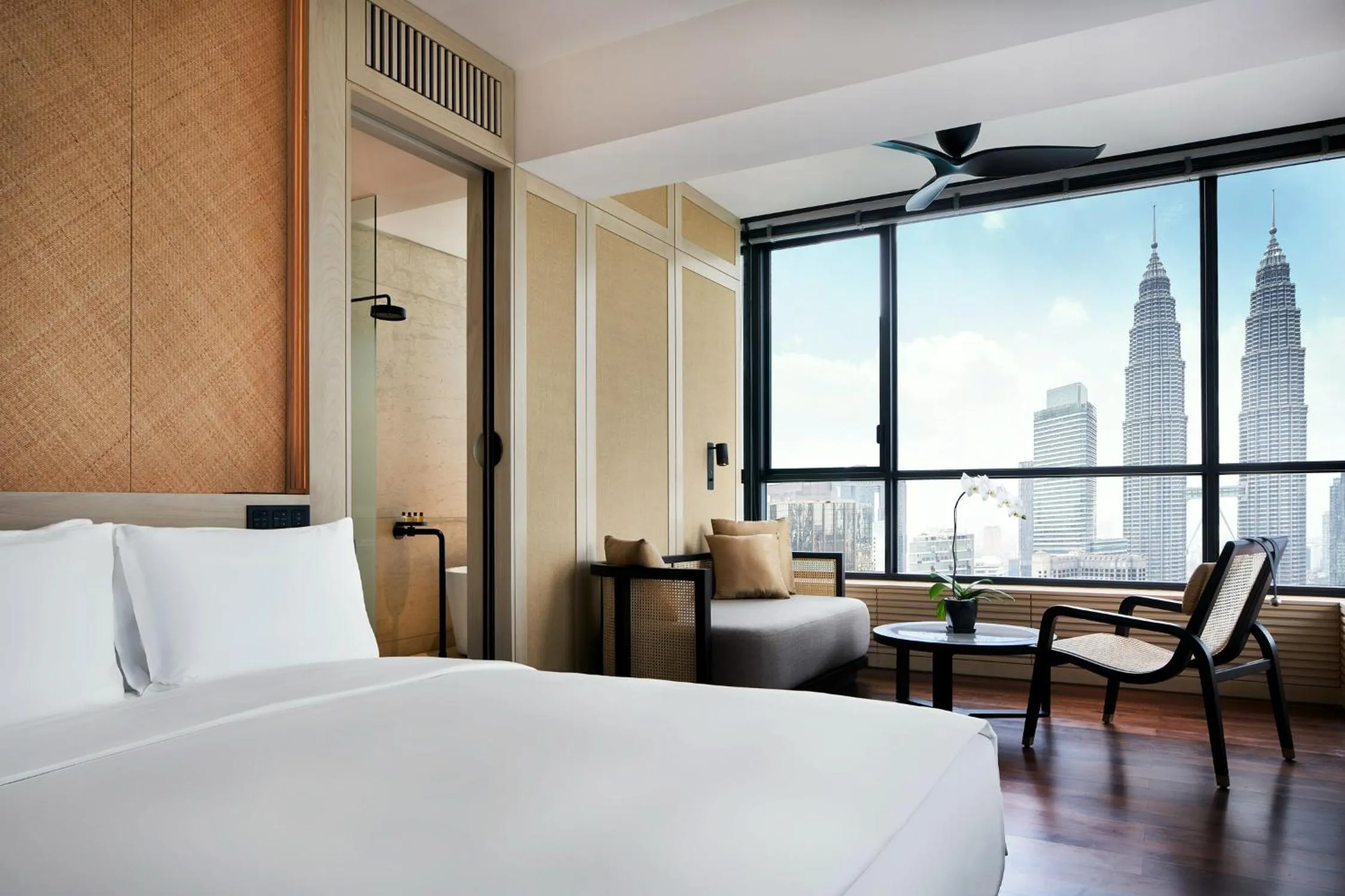 Landmark view, Bed in The RuMa Hotel and Residences
