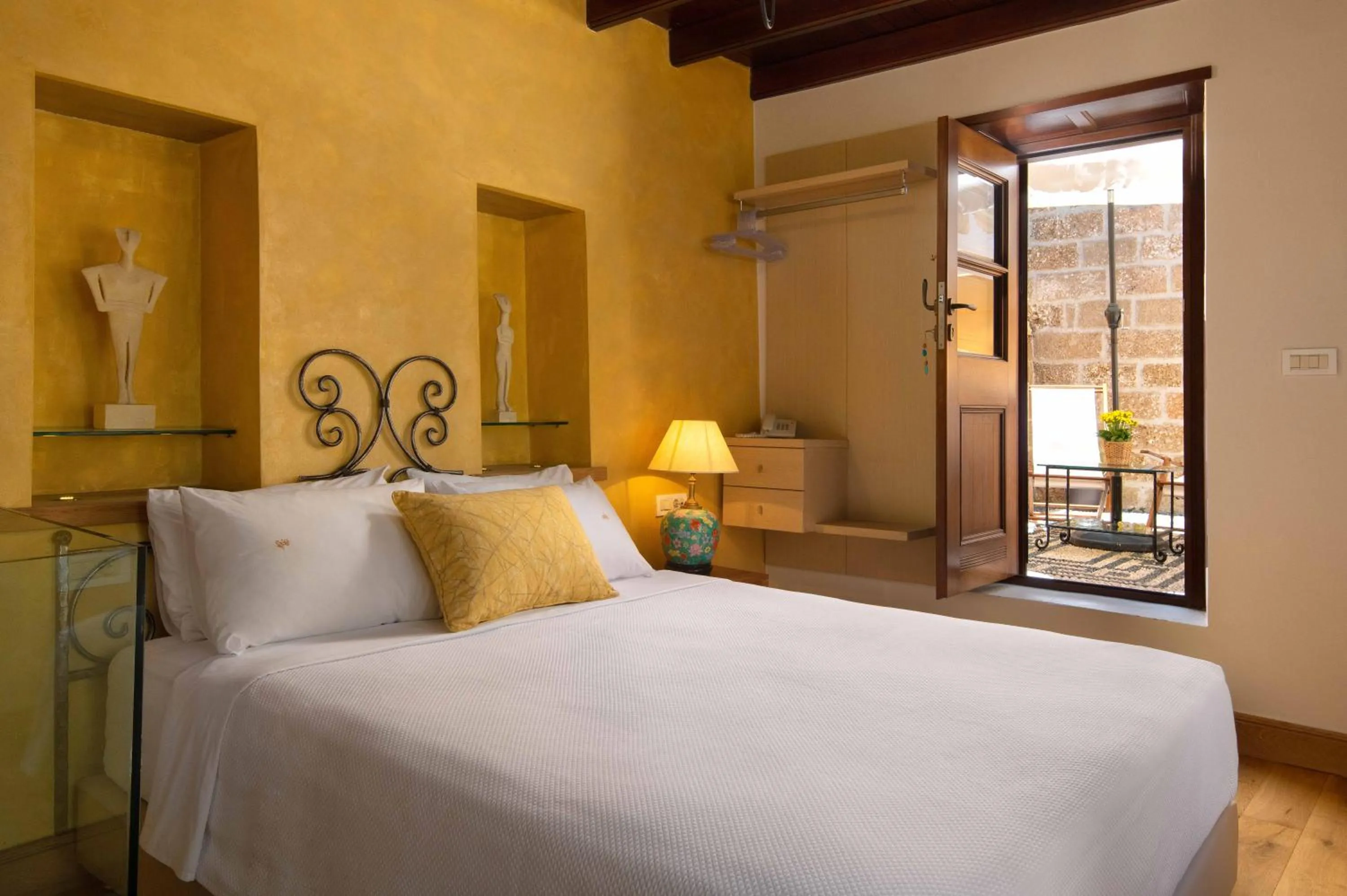 Bed in Rodos Niohori Elite Suites Boutique Hotel