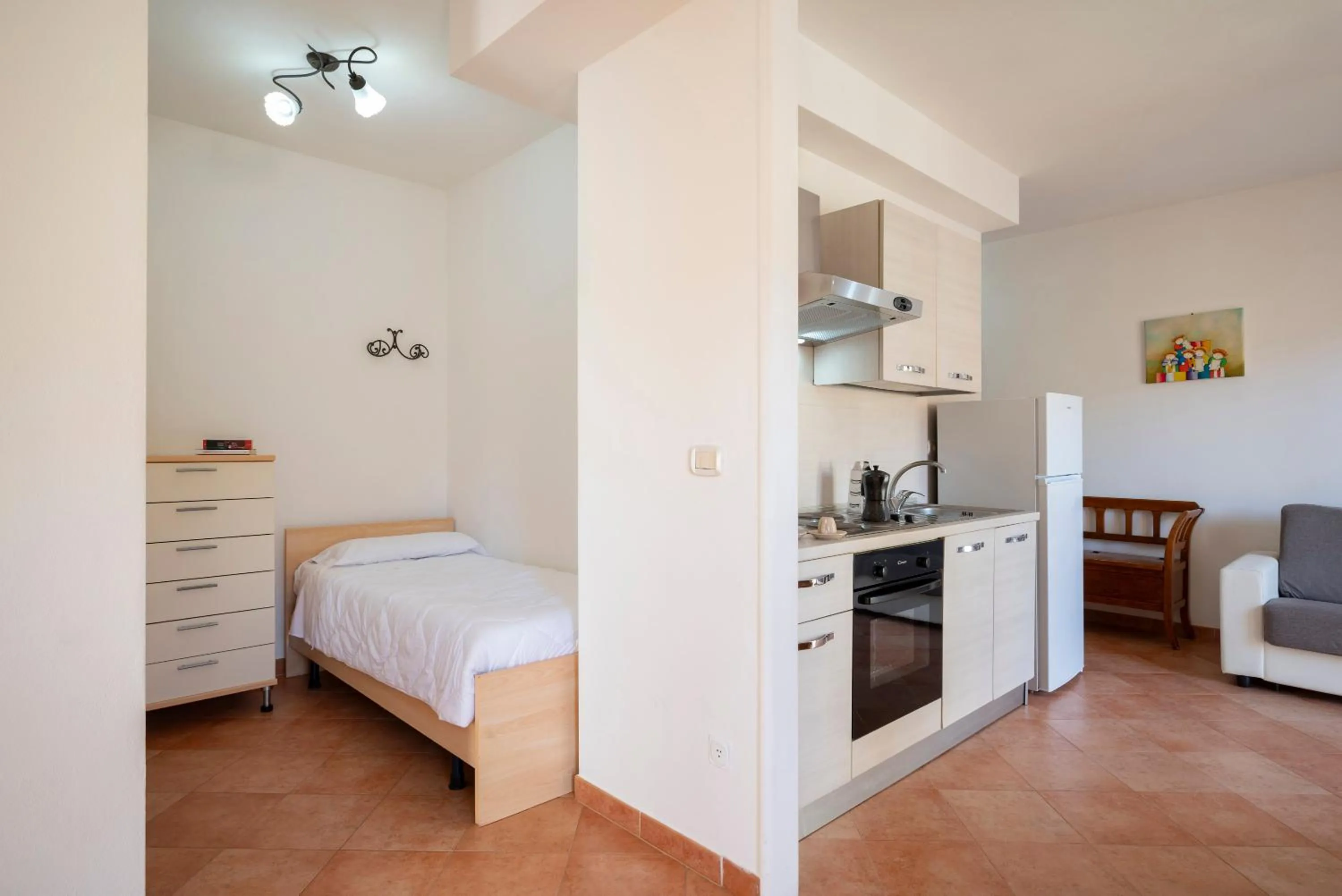 Bed in Lola Piccolo Hotel e Appartamenti