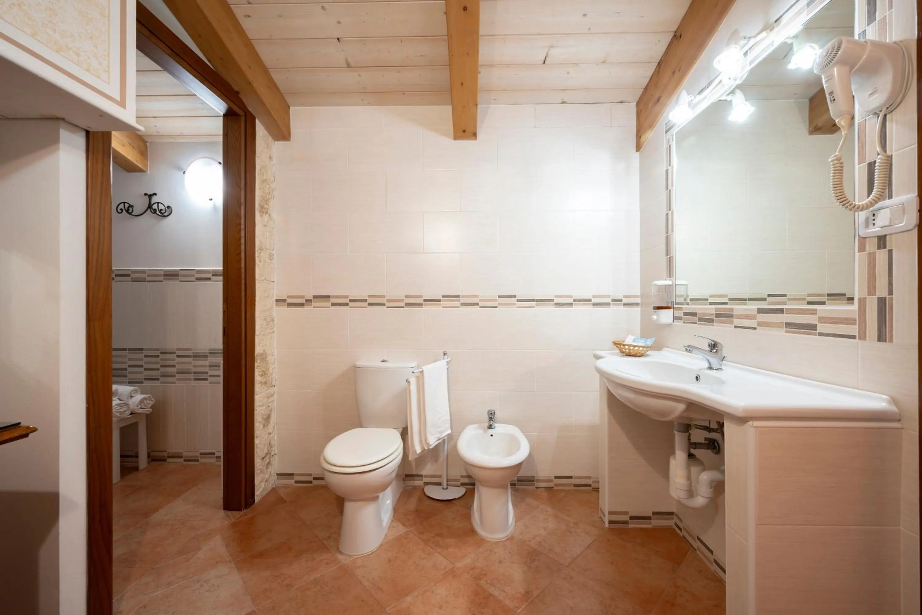 Toilet in Lola Piccolo Hotel e Appartamenti