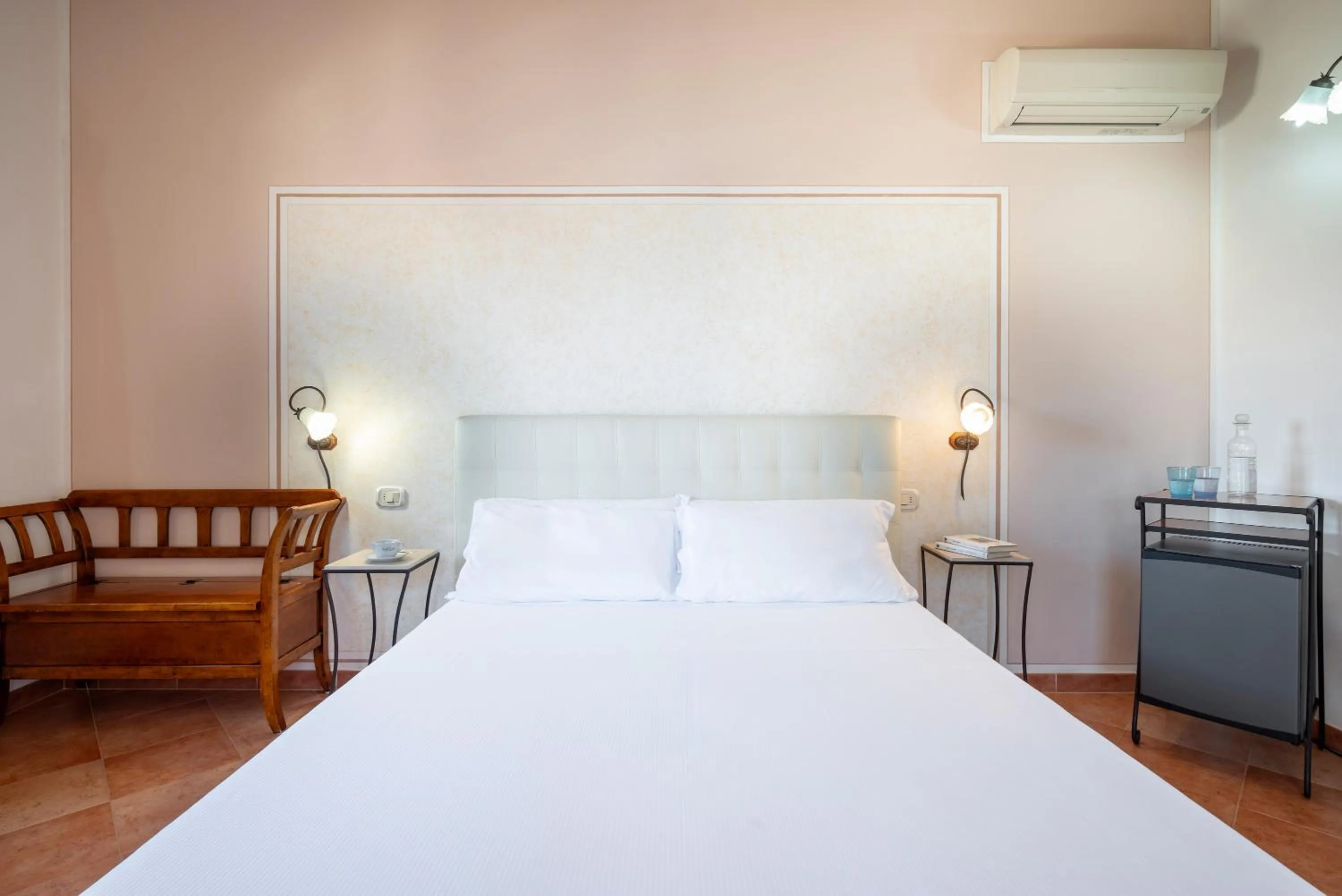 Bedroom in Lola Piccolo Hotel e Appartamenti