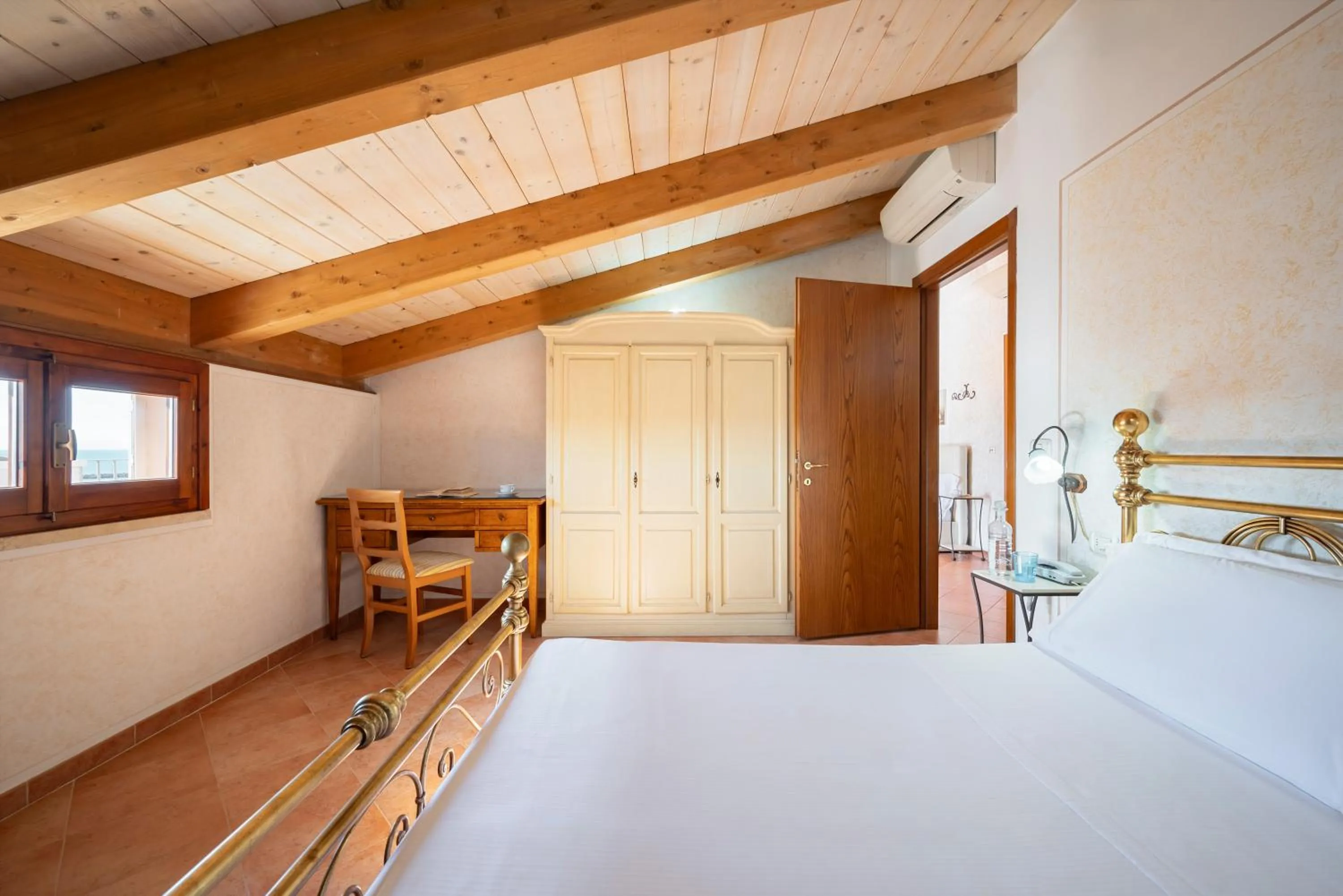 Bed in Lola Piccolo Hotel e Appartamenti