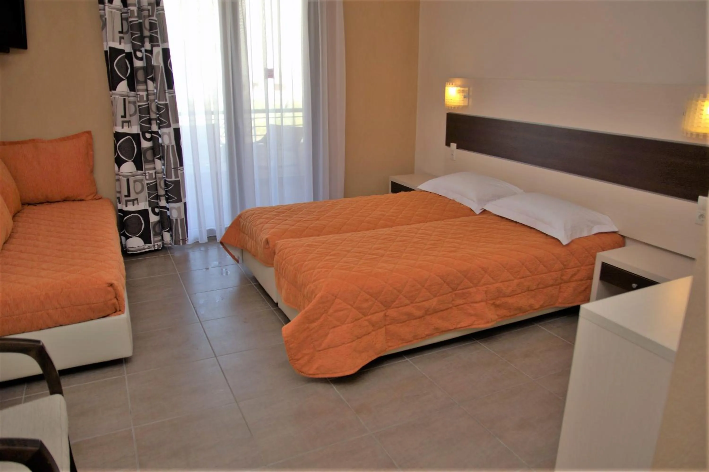 Bed in Alexander Inn