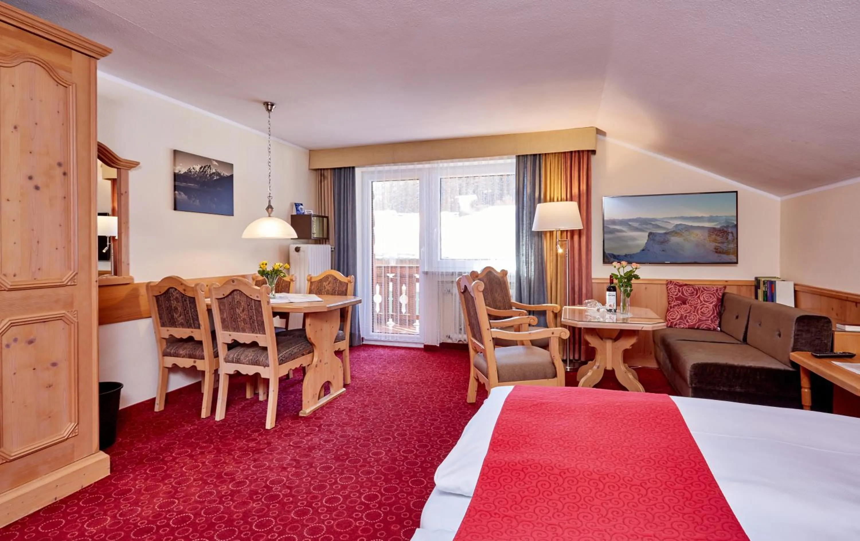 Seating area, Bed in Hotel Franziska