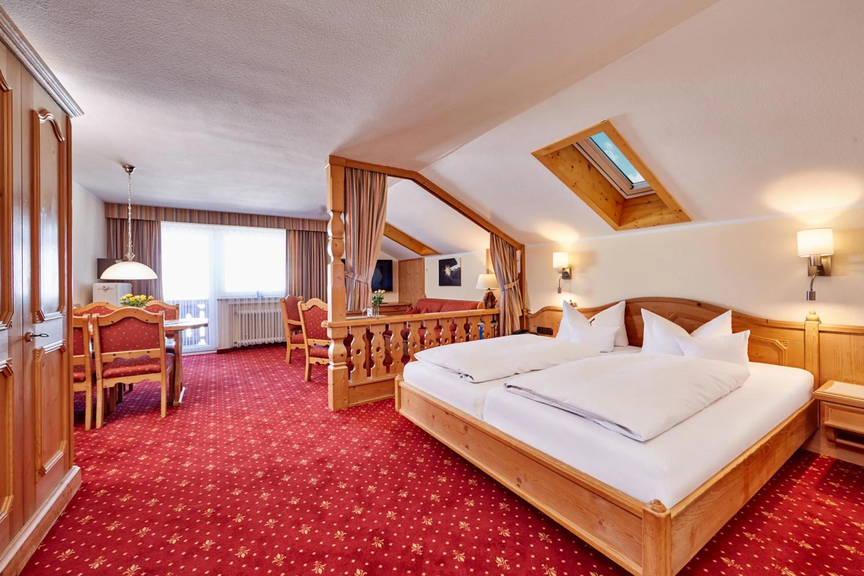 Seating area, Bed in Hotel Franziska