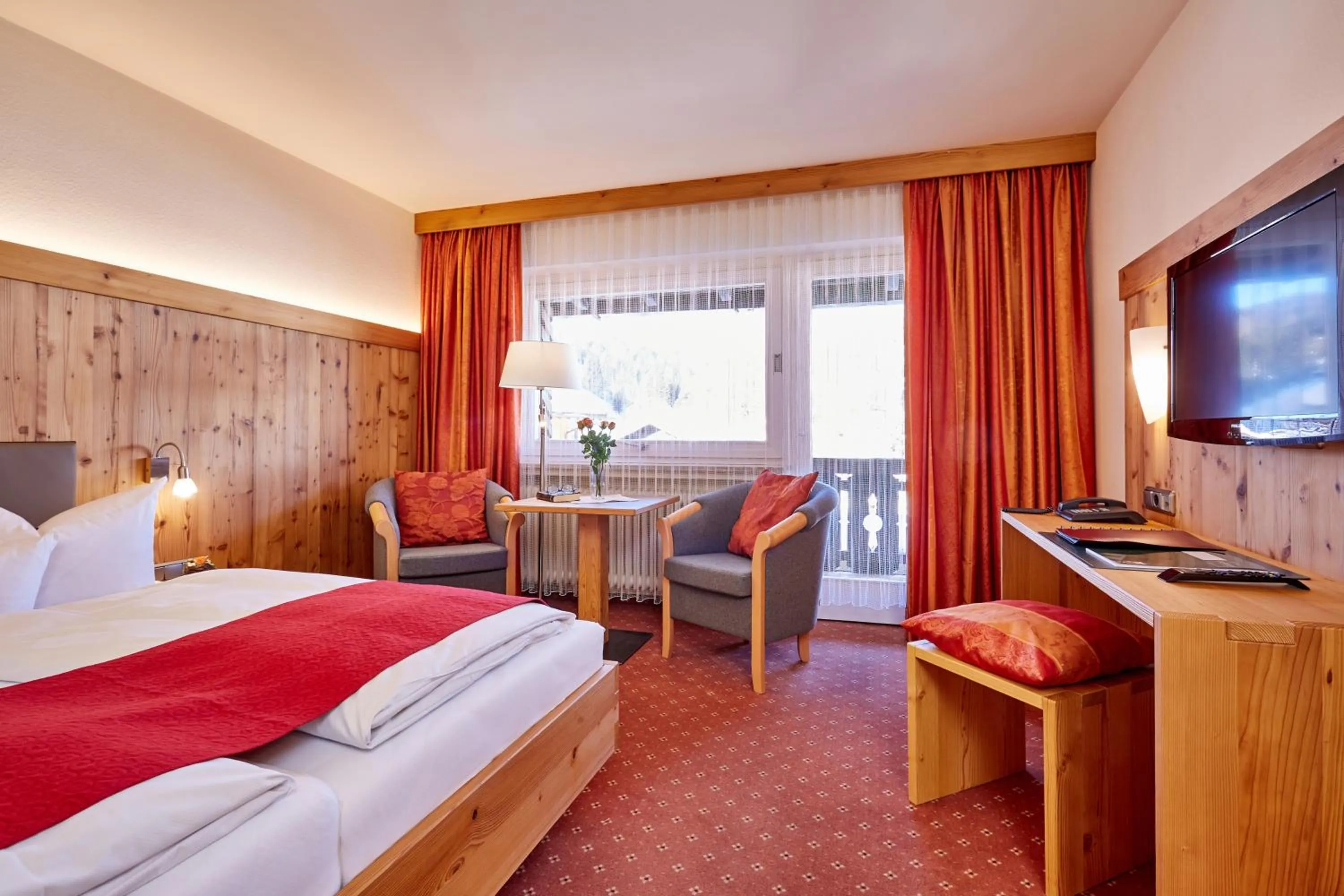 Seating area, Bed in Hotel Franziska