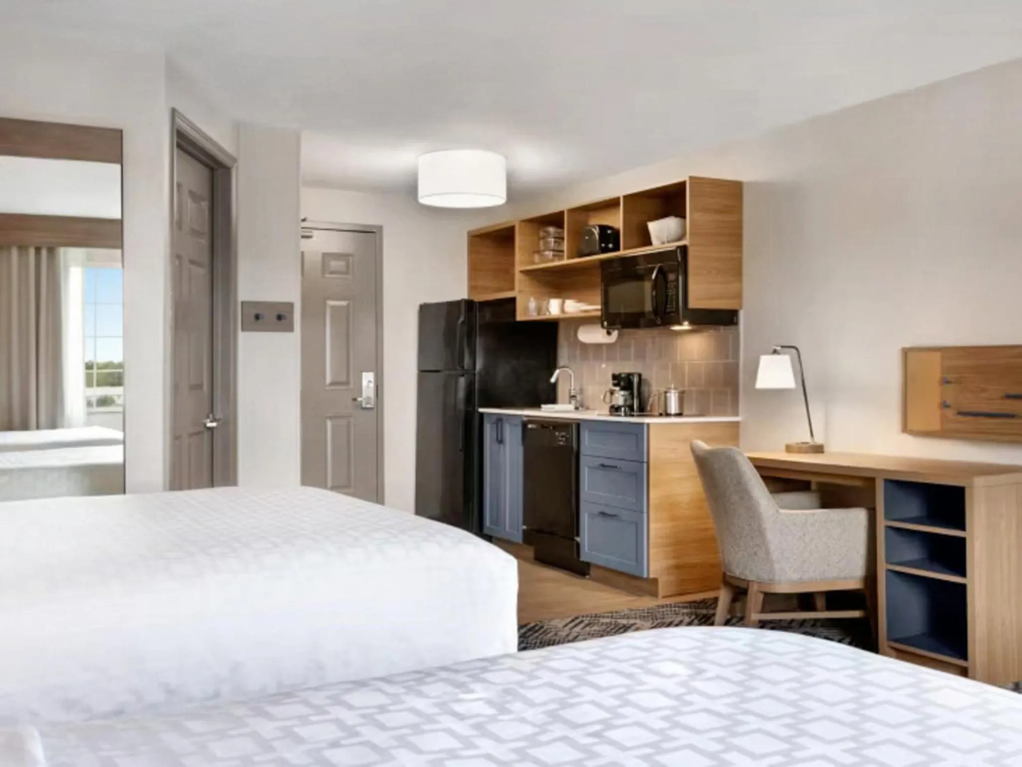 Photo of the whole room, Bed in Candlewood Suites Champaign-Urbana University Area by IHG