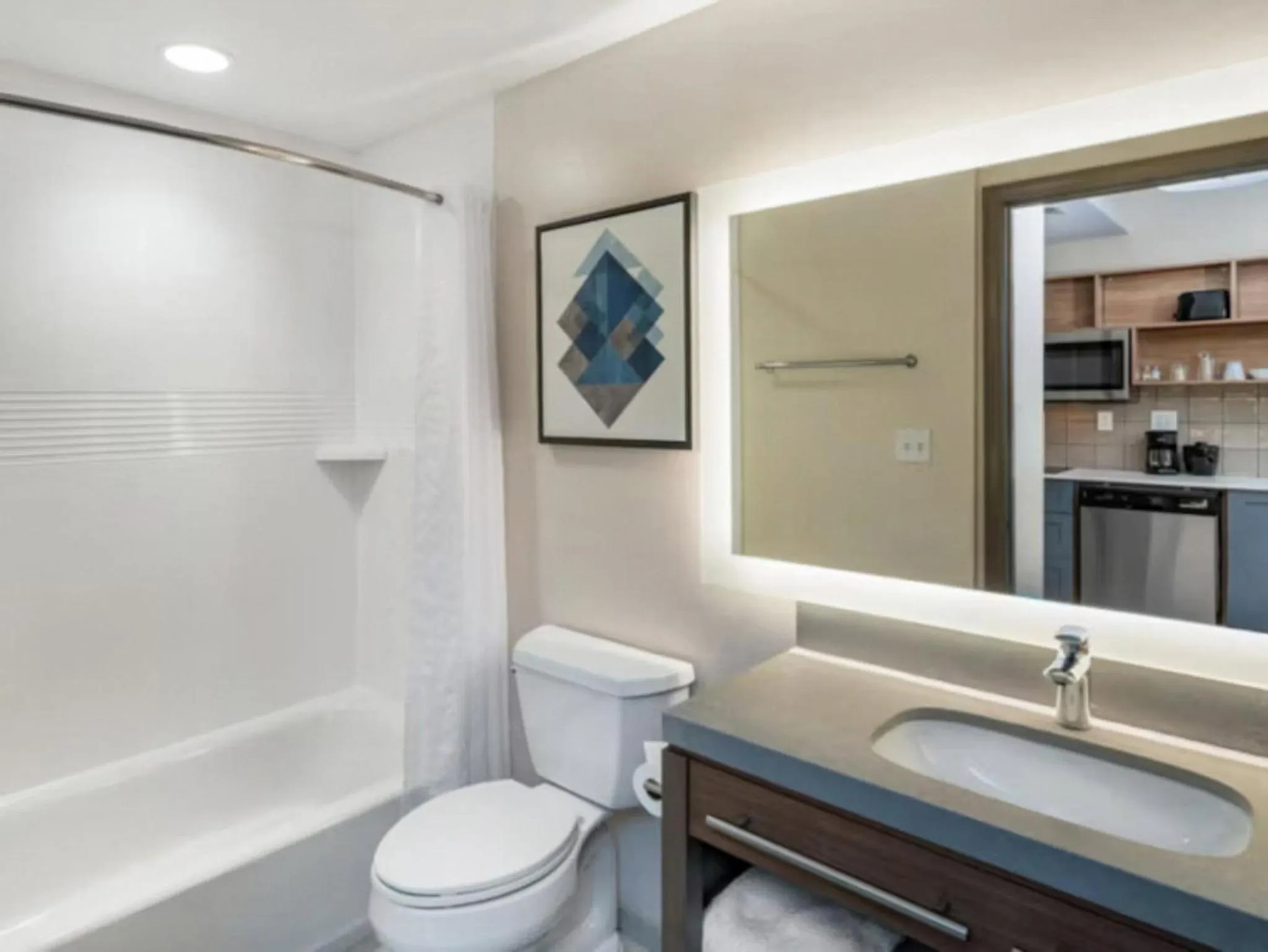 Bathroom in Candlewood Suites Champaign-Urbana University Area by IHG