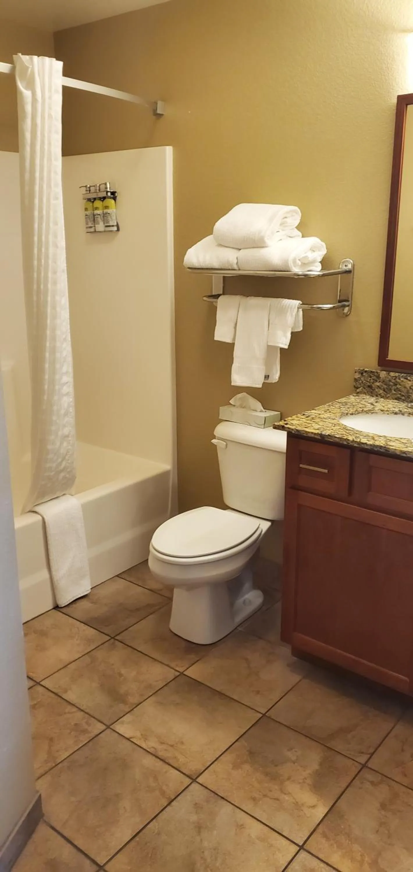 Bathroom in Candlewood Suites Champaign-Urbana University Area by IHG