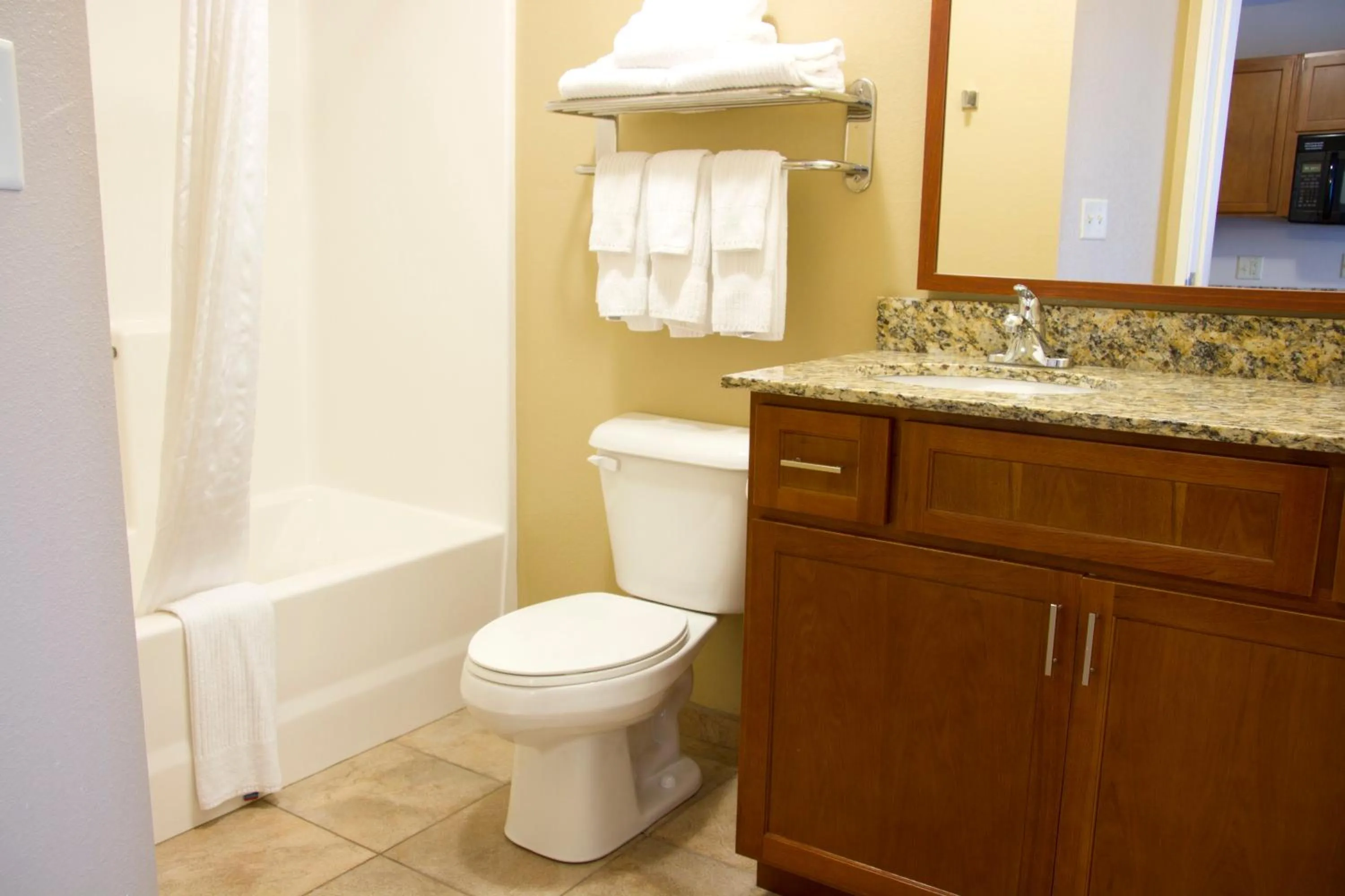 Bathroom in Candlewood Suites Champaign-Urbana University Area by IHG