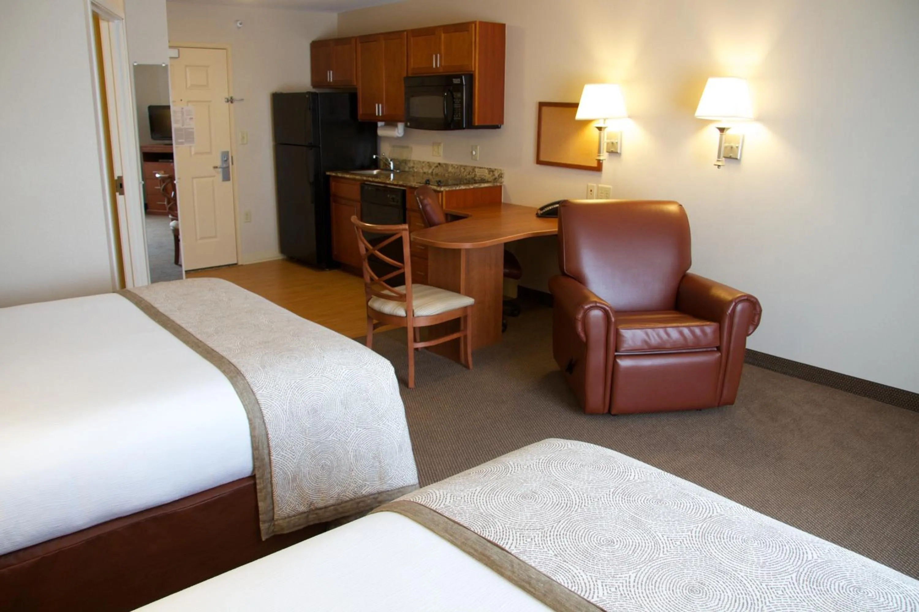 Photo of the whole room, Bed in Candlewood Suites Champaign-Urbana University Area by IHG
