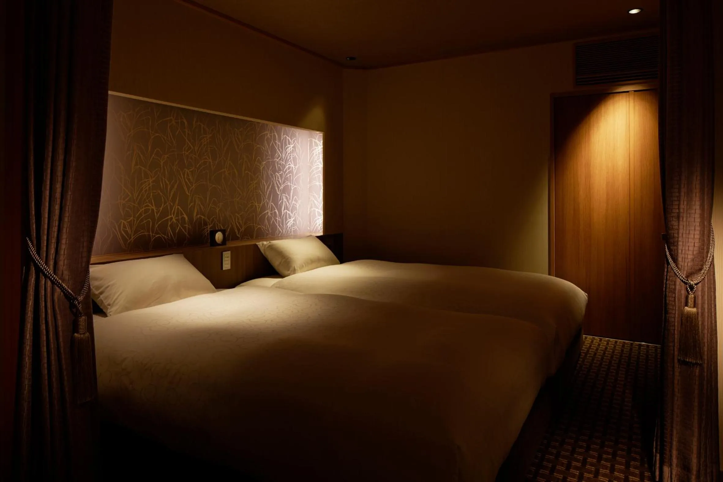 Bed in Laforet Shuzenji Sanshisuimei