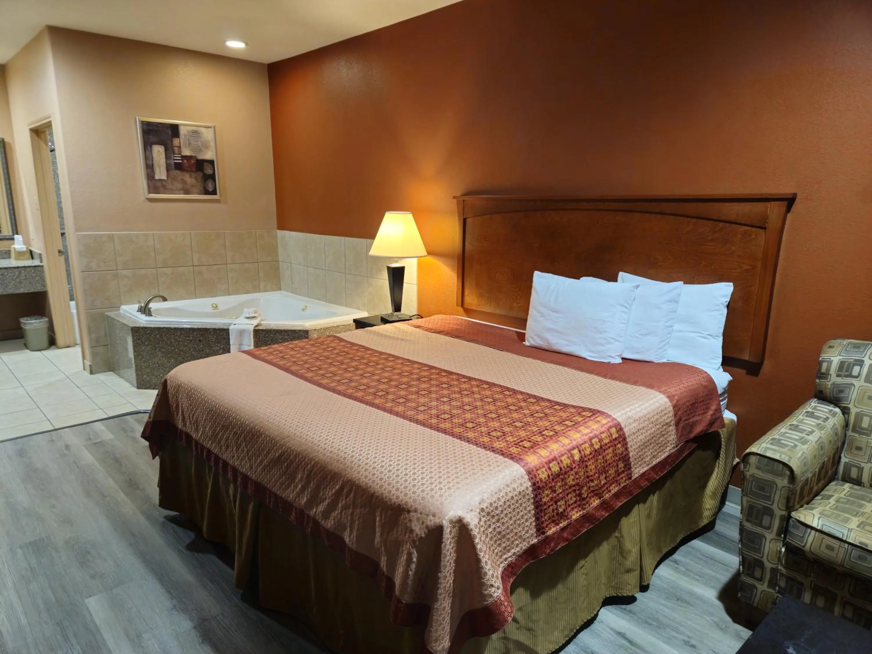 Bed in Budgetel Inn and Suites