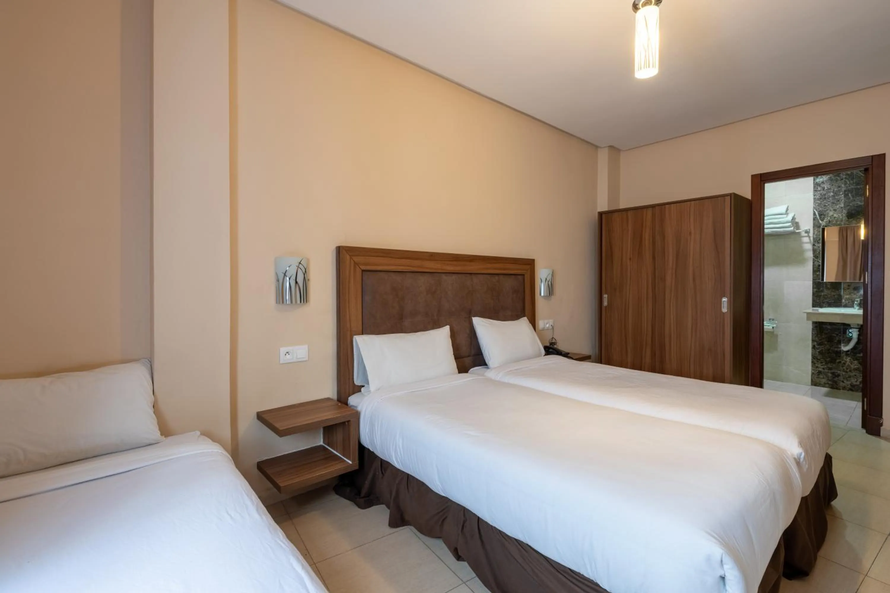 Bed in Hotel Etoile Du Nord