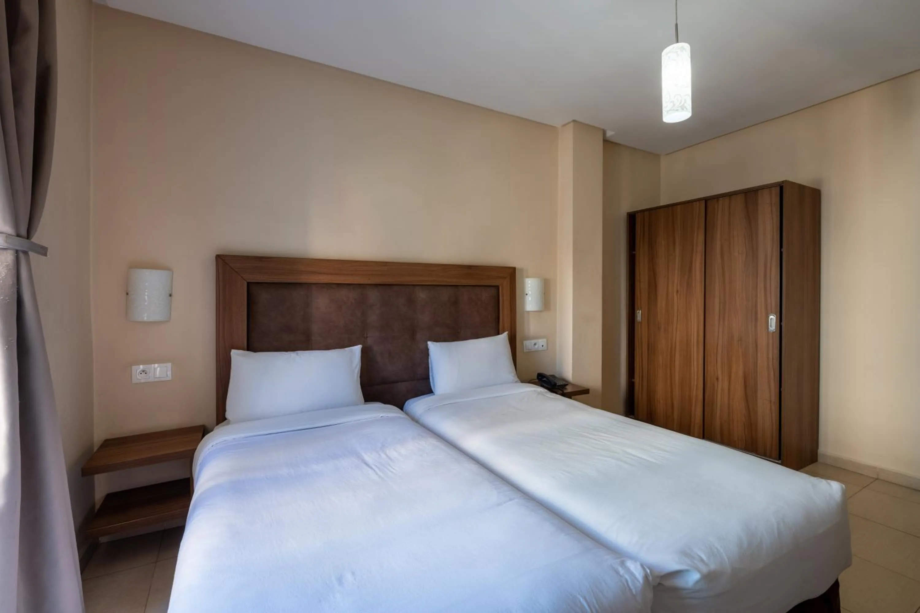 Bed in Hotel Etoile Du Nord