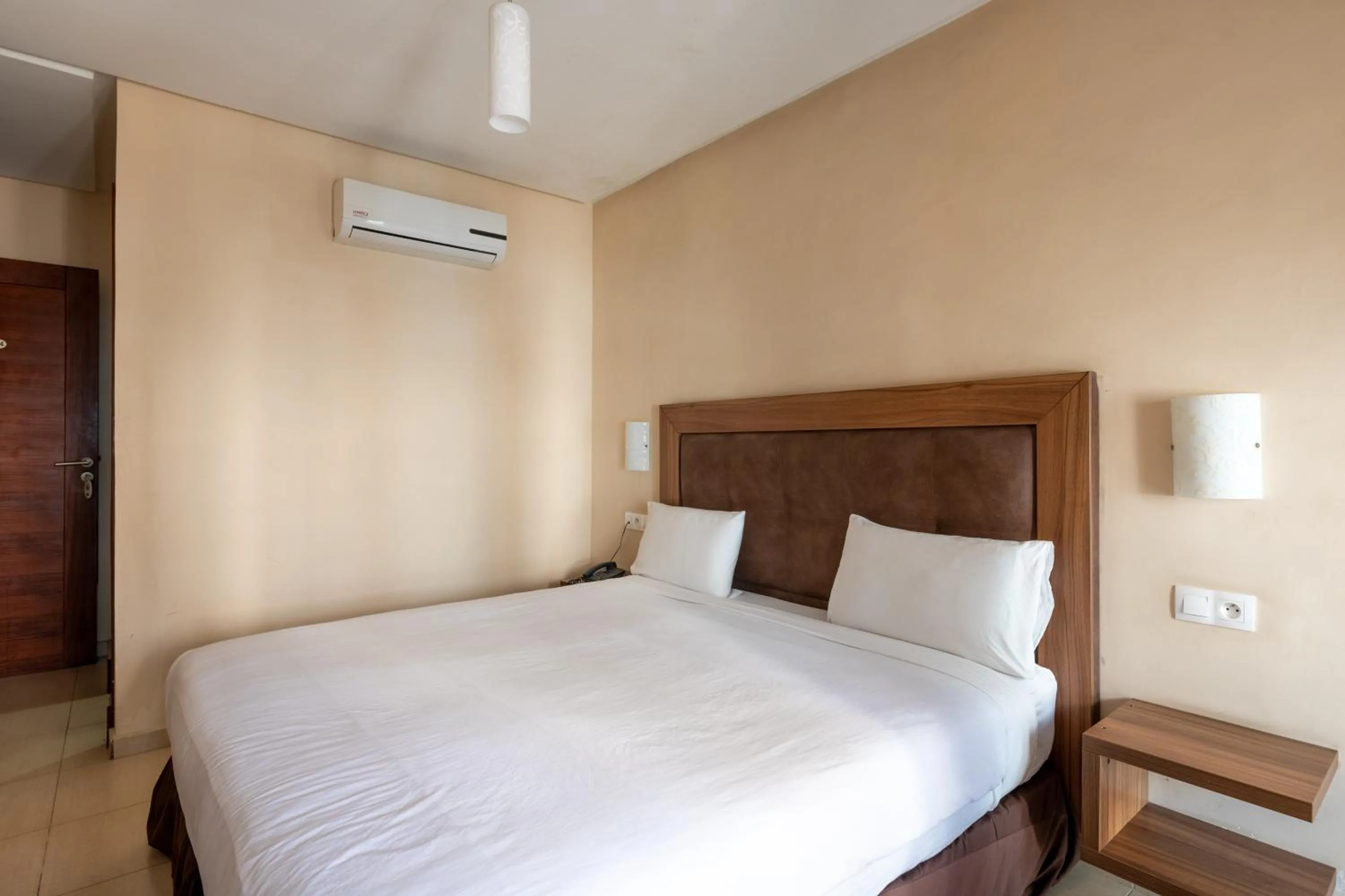 Bed in Hotel Etoile Du Nord