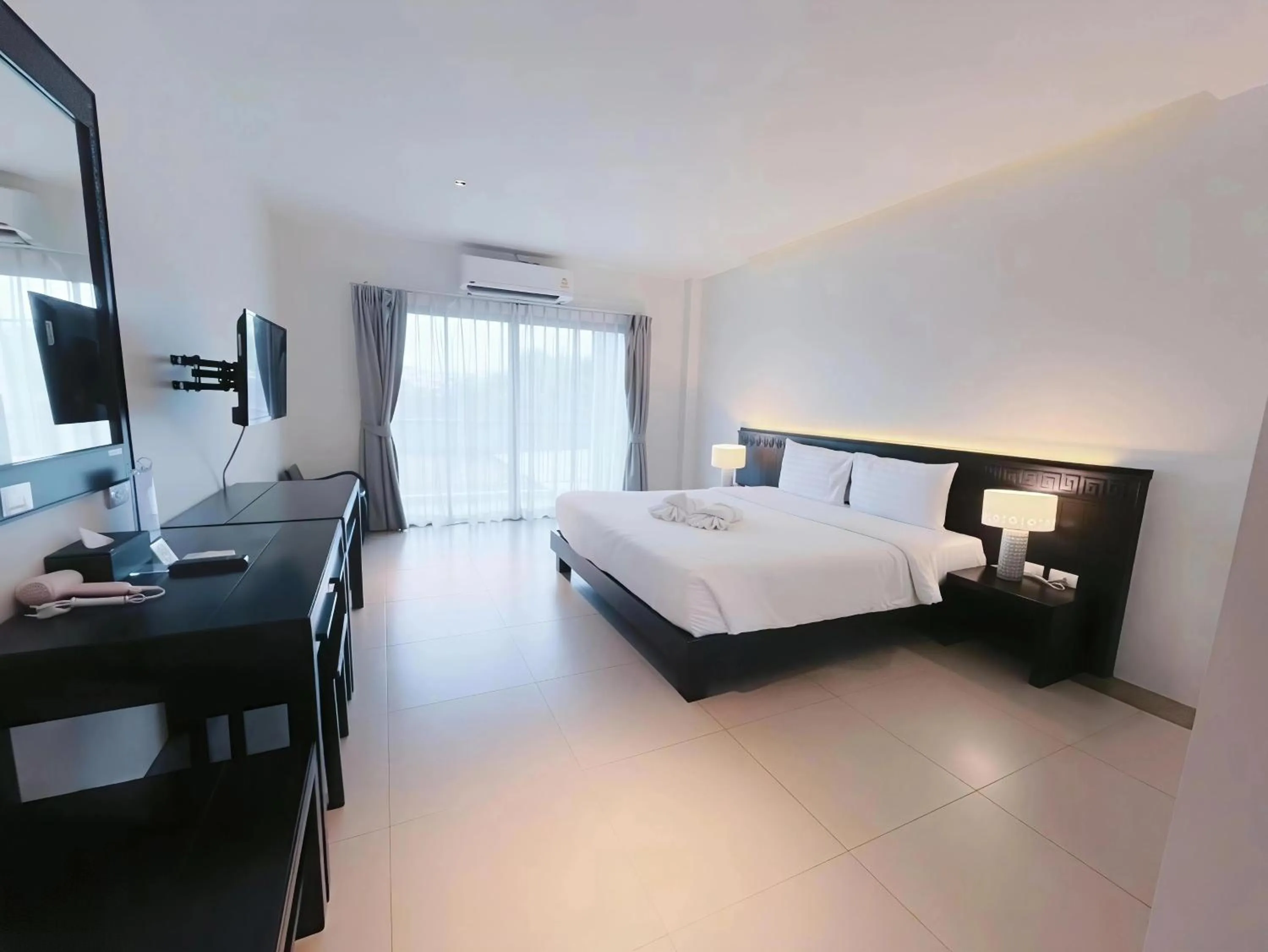 Photo of the whole room, Bed in Phuketa Hotel Phuket Town