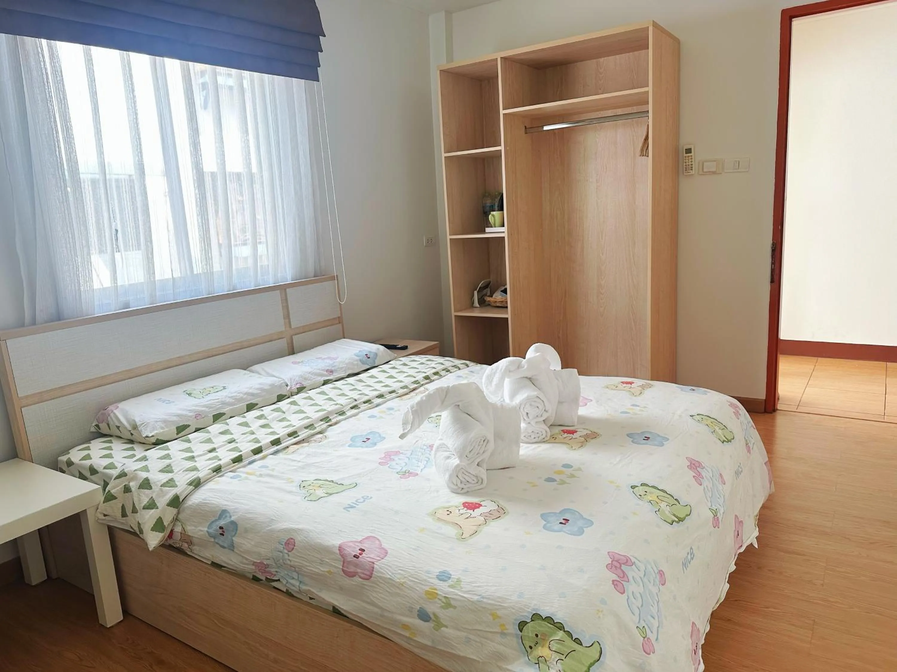 Photo of the whole room, Bed in TD Bangkok