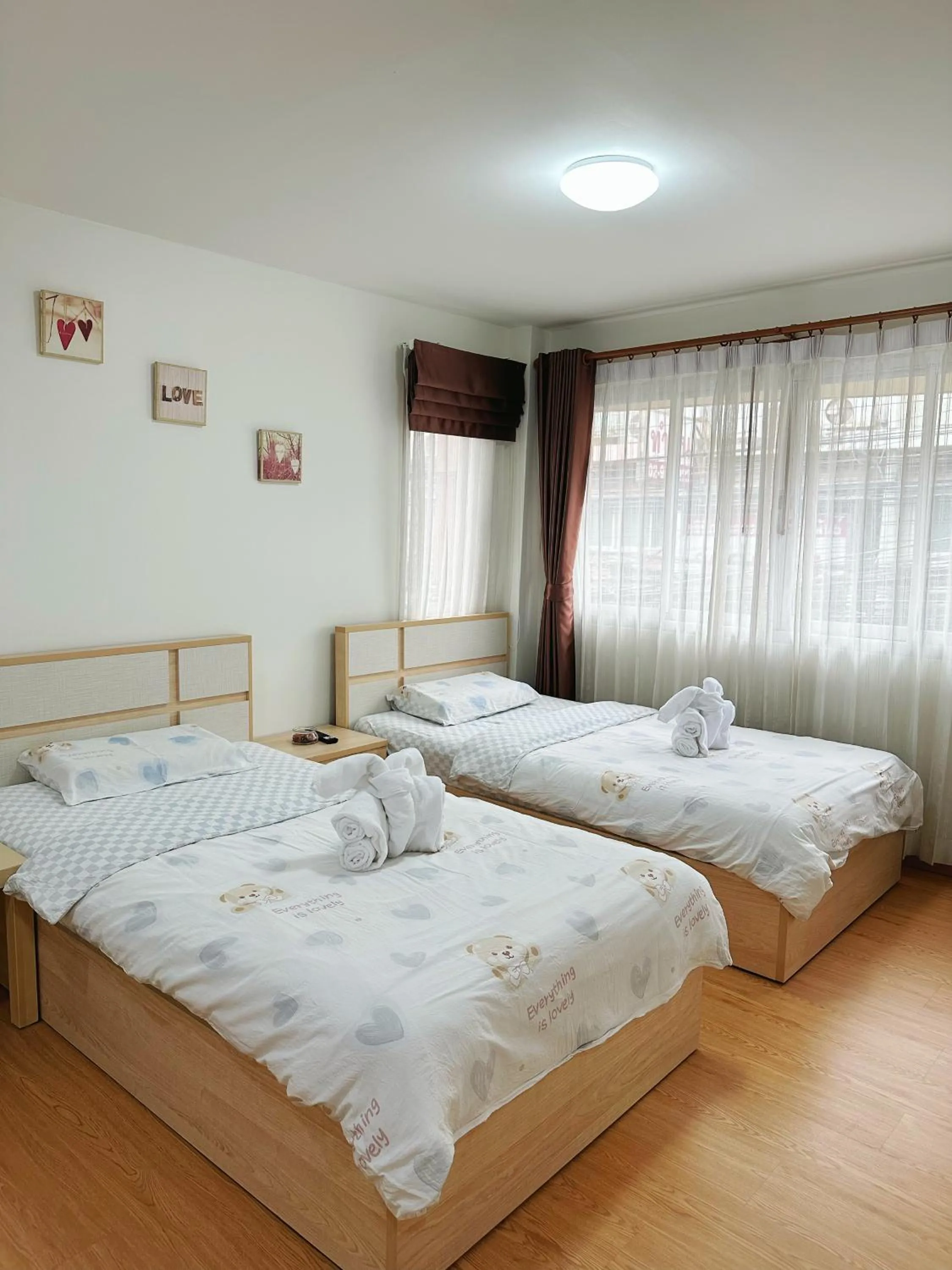 Photo of the whole room, Bed in TD Bangkok