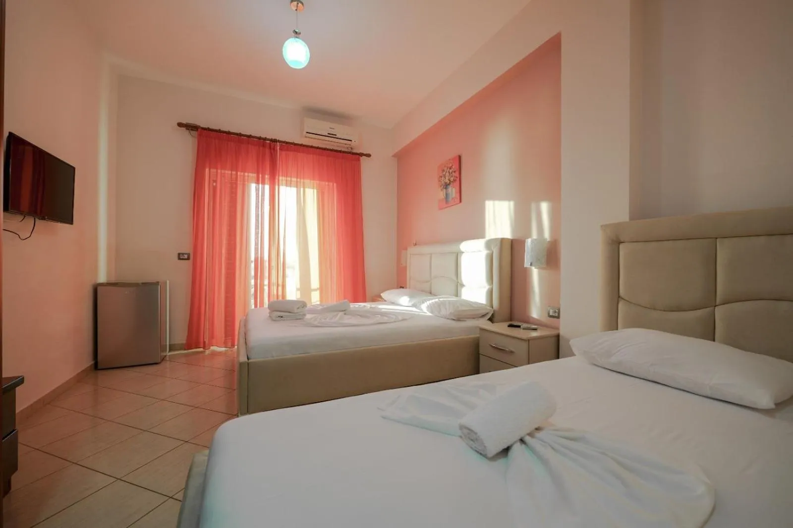 Bed in Unico ApartHotel