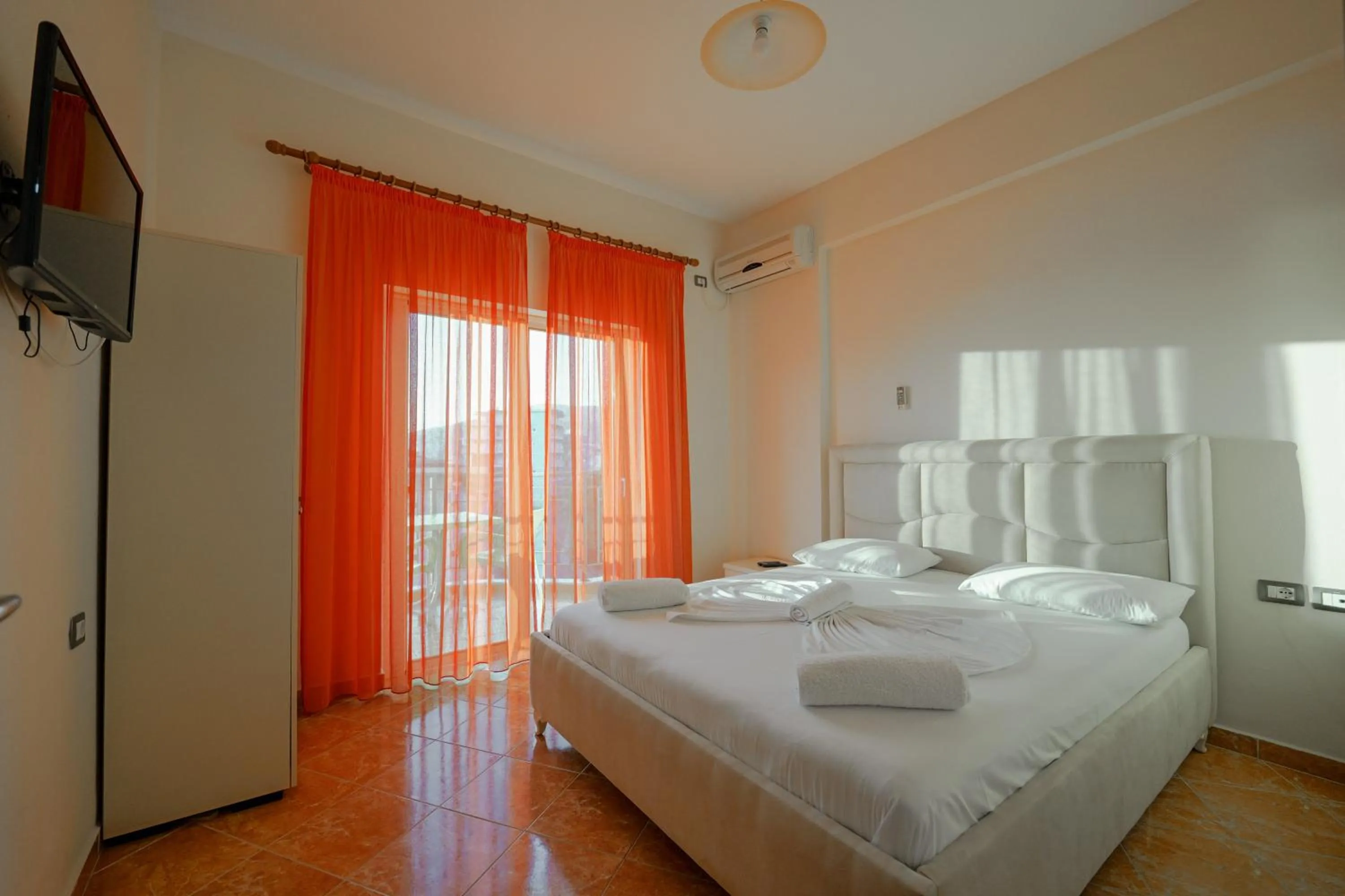 Bed in Unico ApartHotel