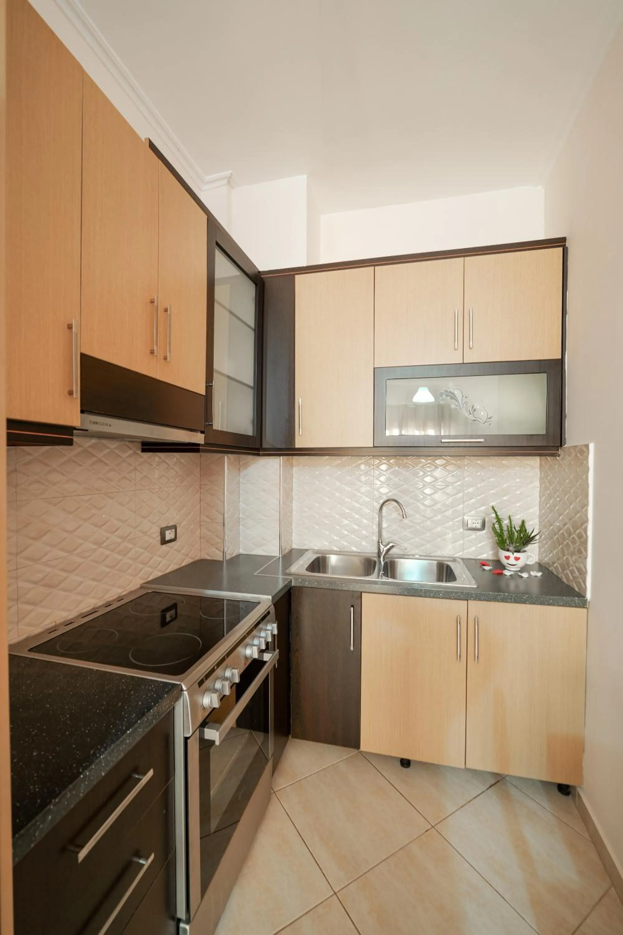 Kitchen or kitchenette in Unico ApartHotel