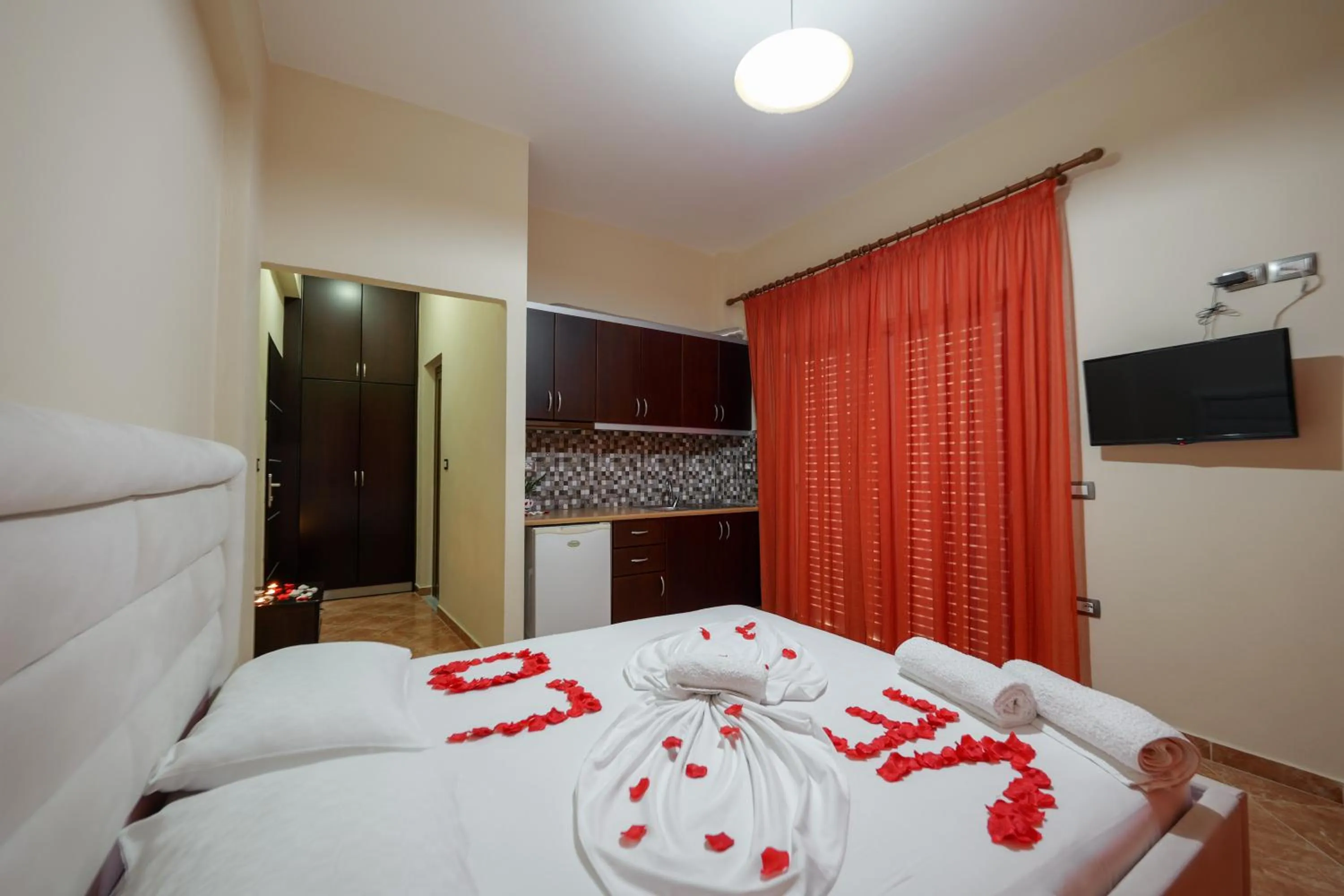 Bed in Unico ApartHotel