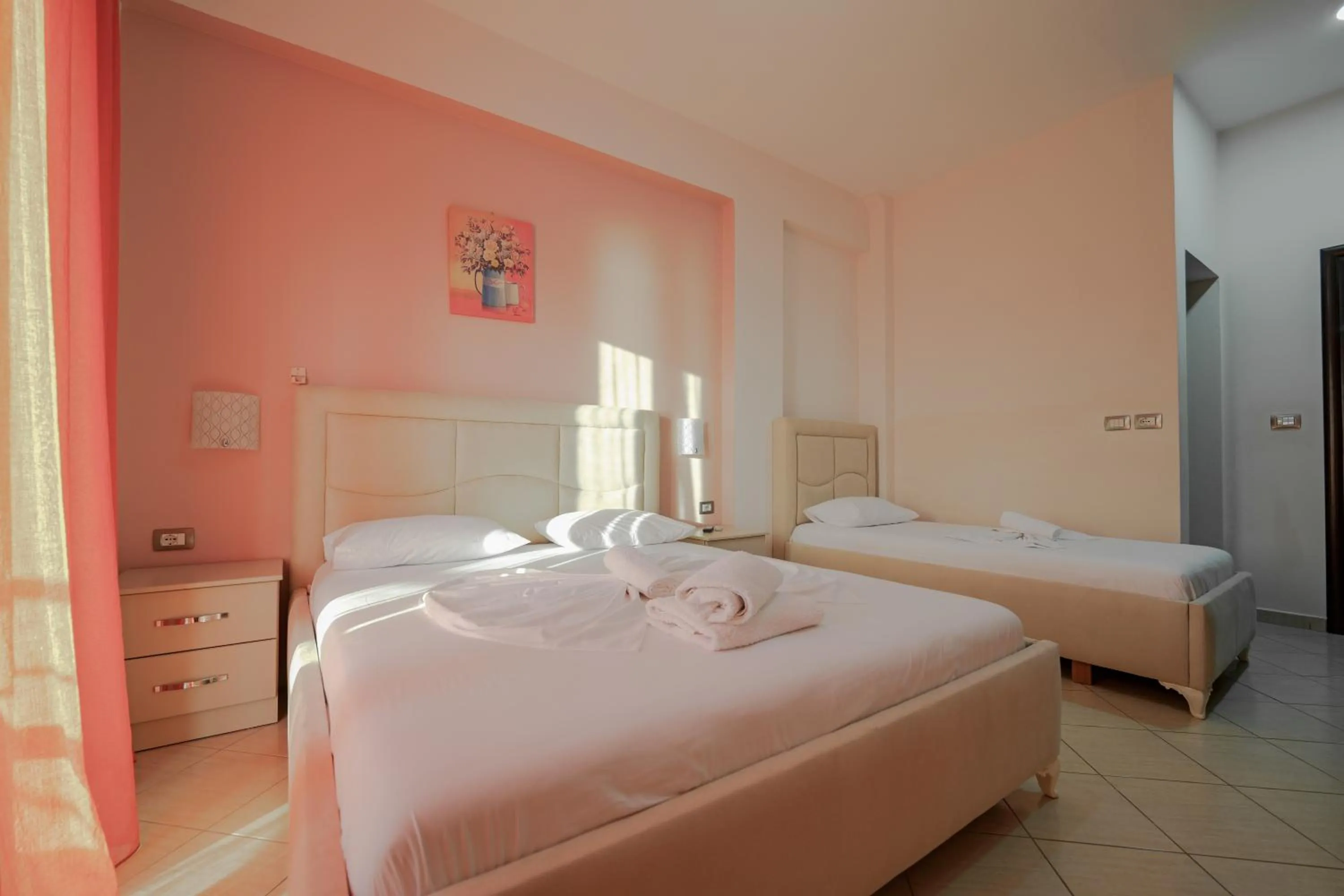 Bed in Unico ApartHotel