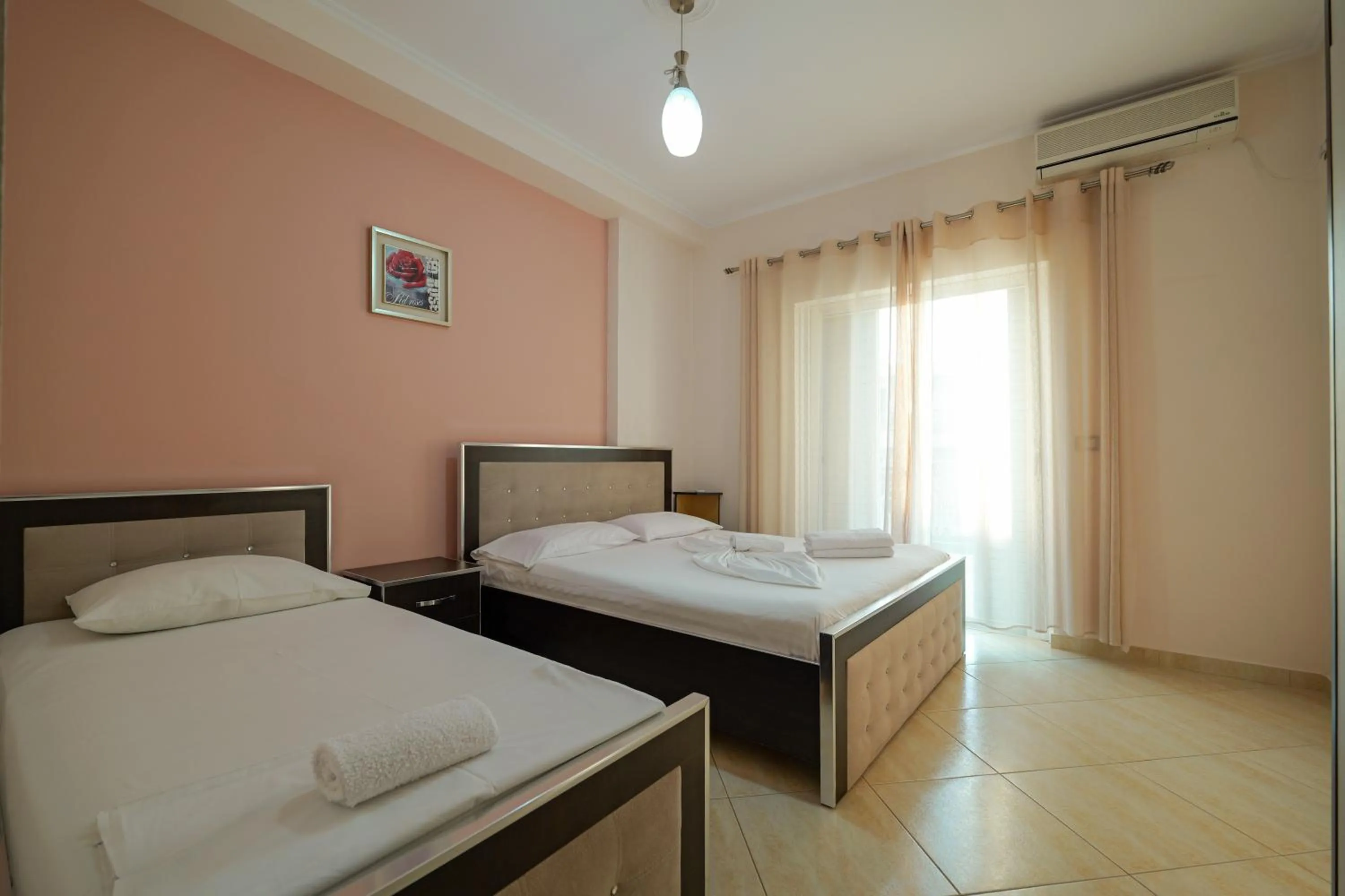 Bed in Unico ApartHotel