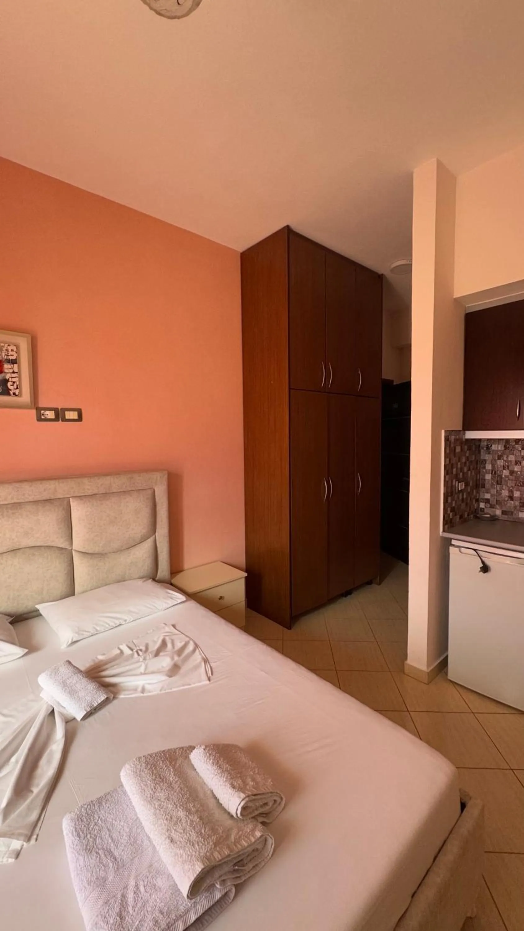 Bed in Unico ApartHotel