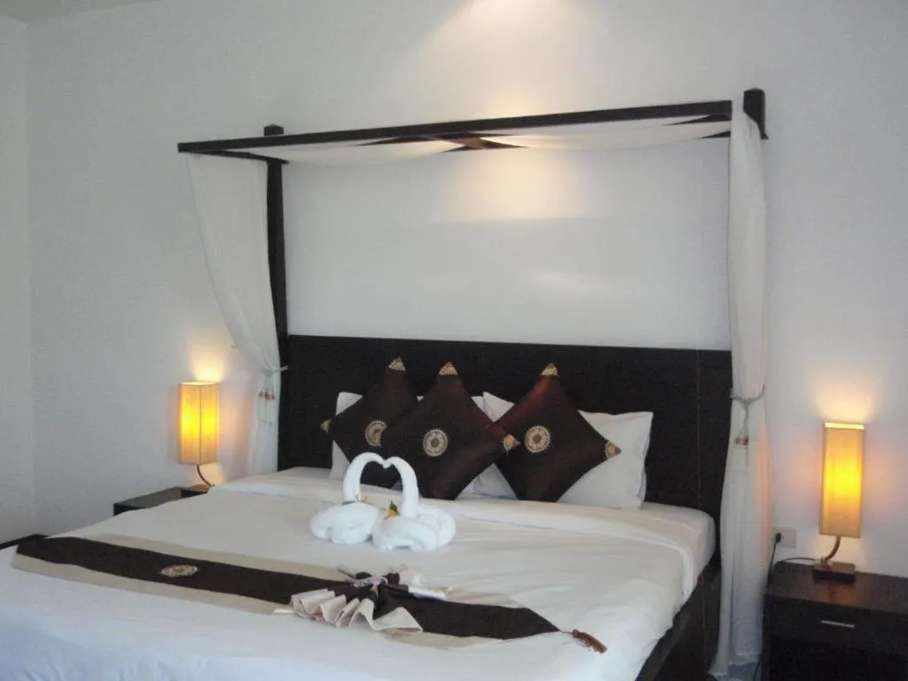 Bed in Phuket Monaburi Boutique Hotel