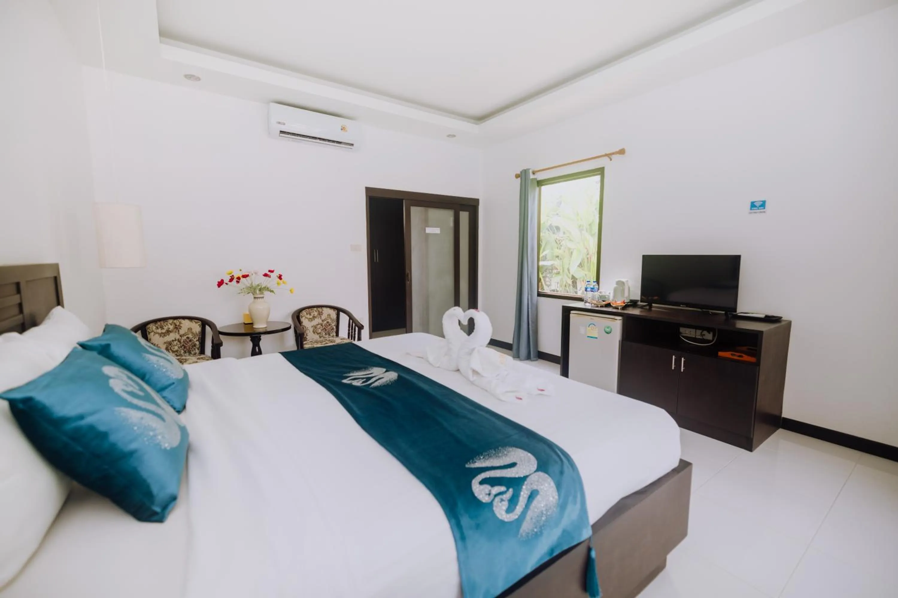 Bed in Phuket Monaburi Boutique Hotel