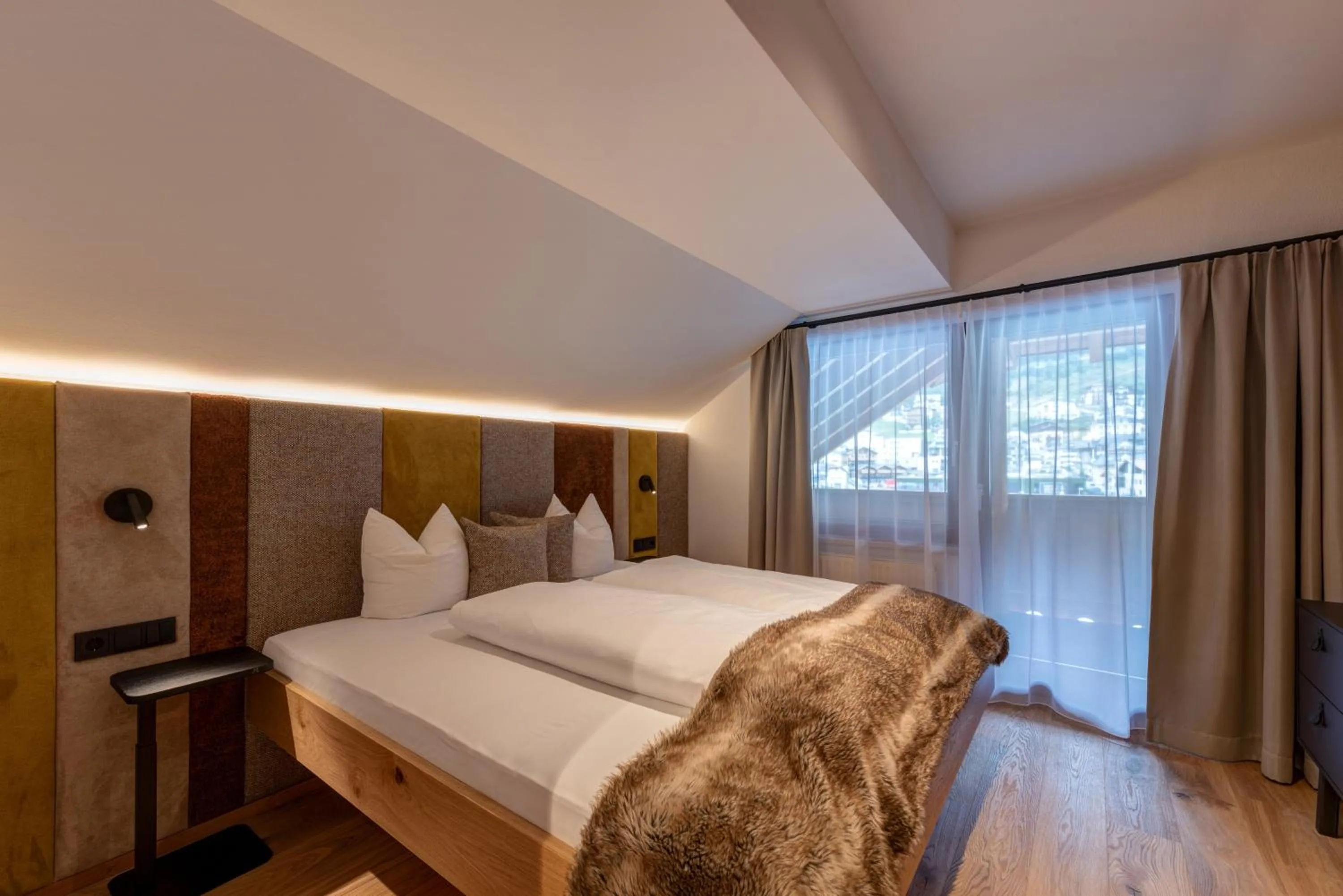 Bed in Hotel Garni Mirabell