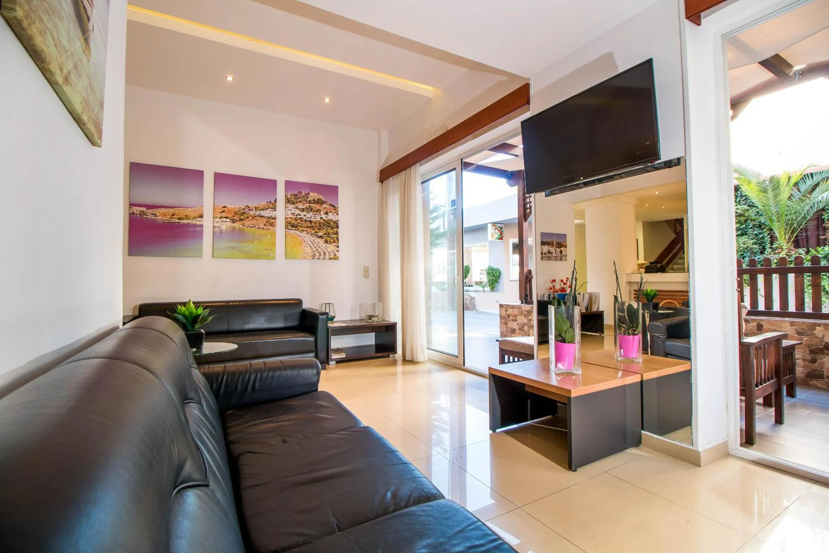 Communal lounge/ TV room in Filmar Hotel, Ixia, Rhodes