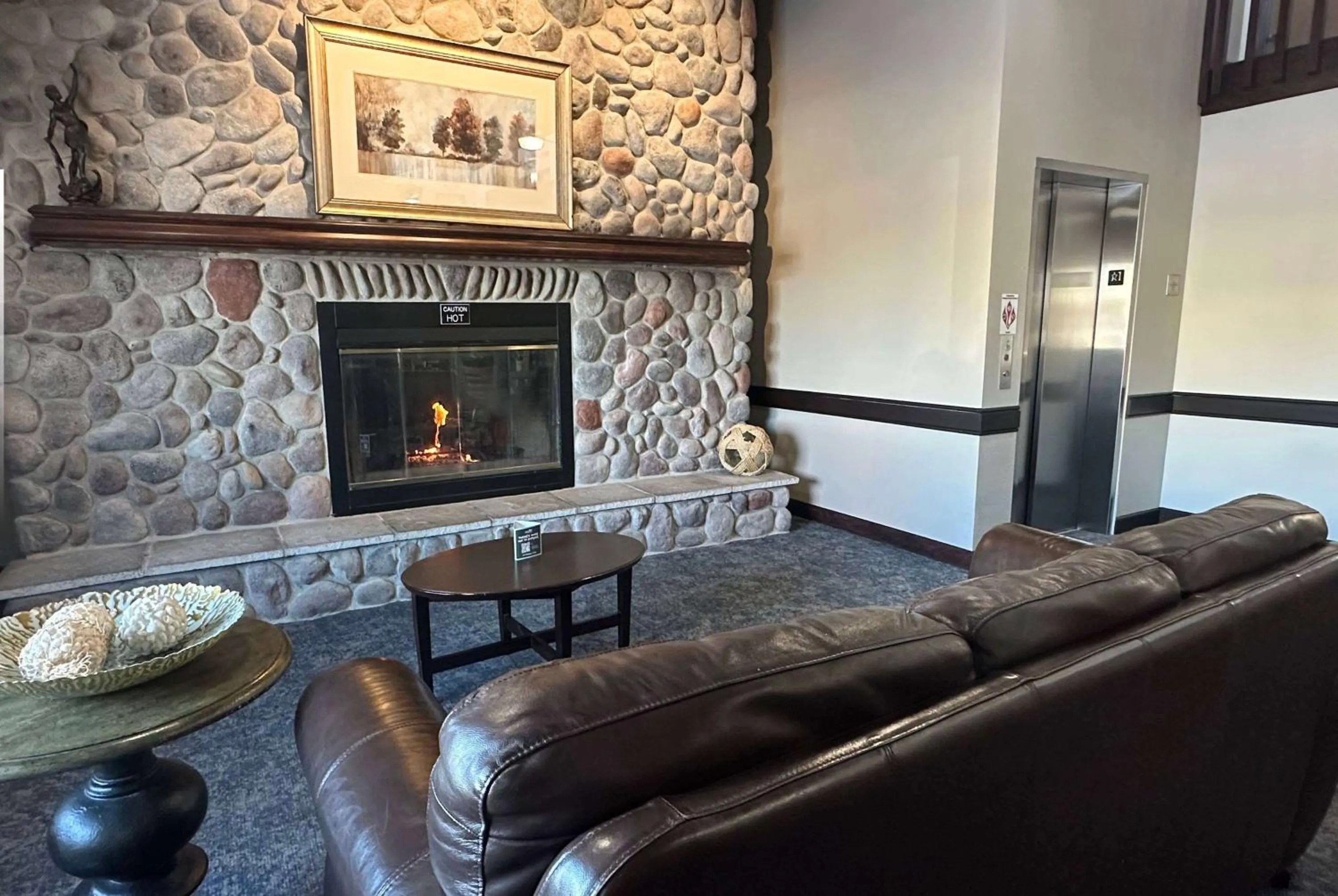 Lobby or reception in AmericInn by Wyndham Menominee